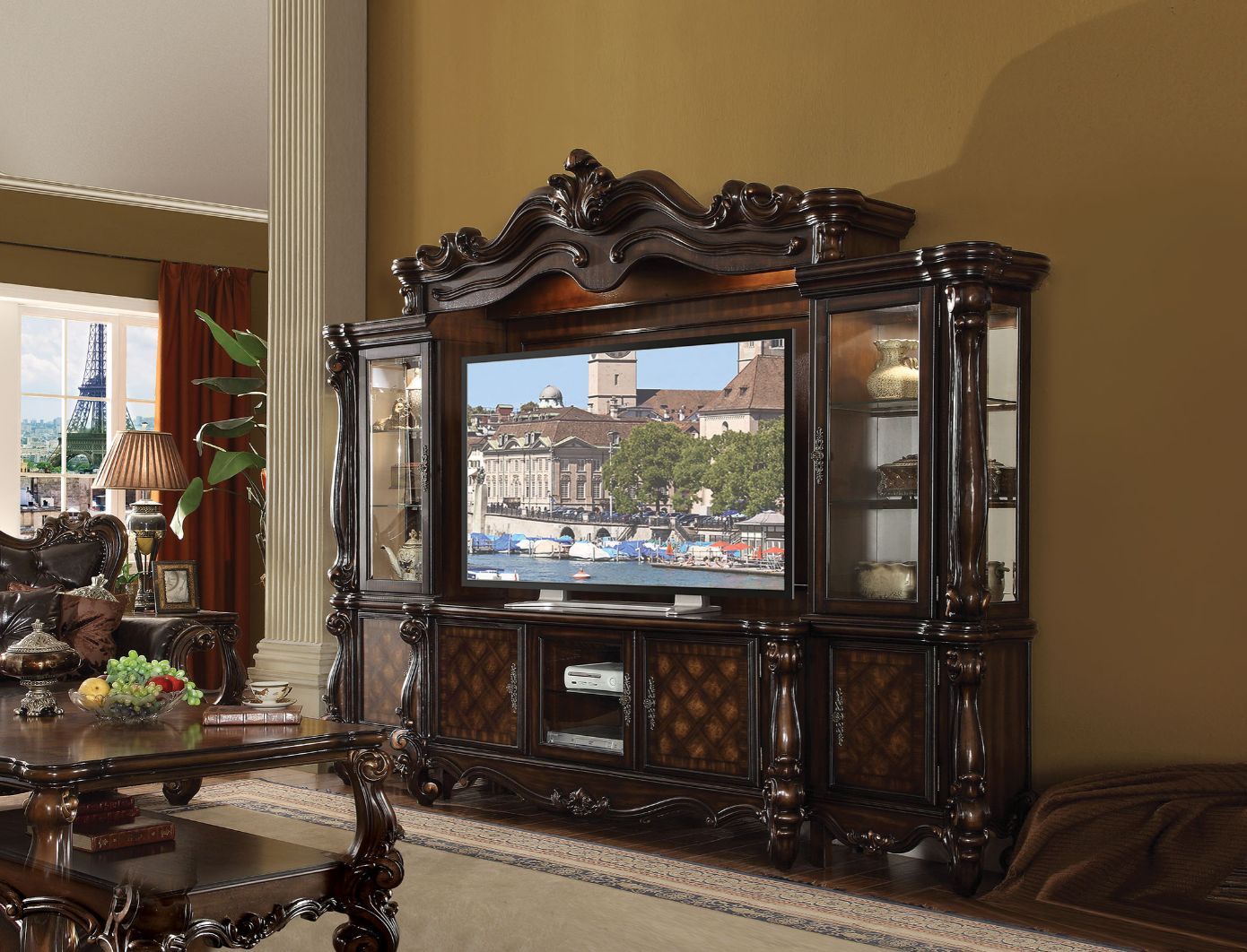ACME The Versailles the entertainment center was inspired by old European design. This collection features carved scrollwork accent on the bridge's crown. | Meri Furniture