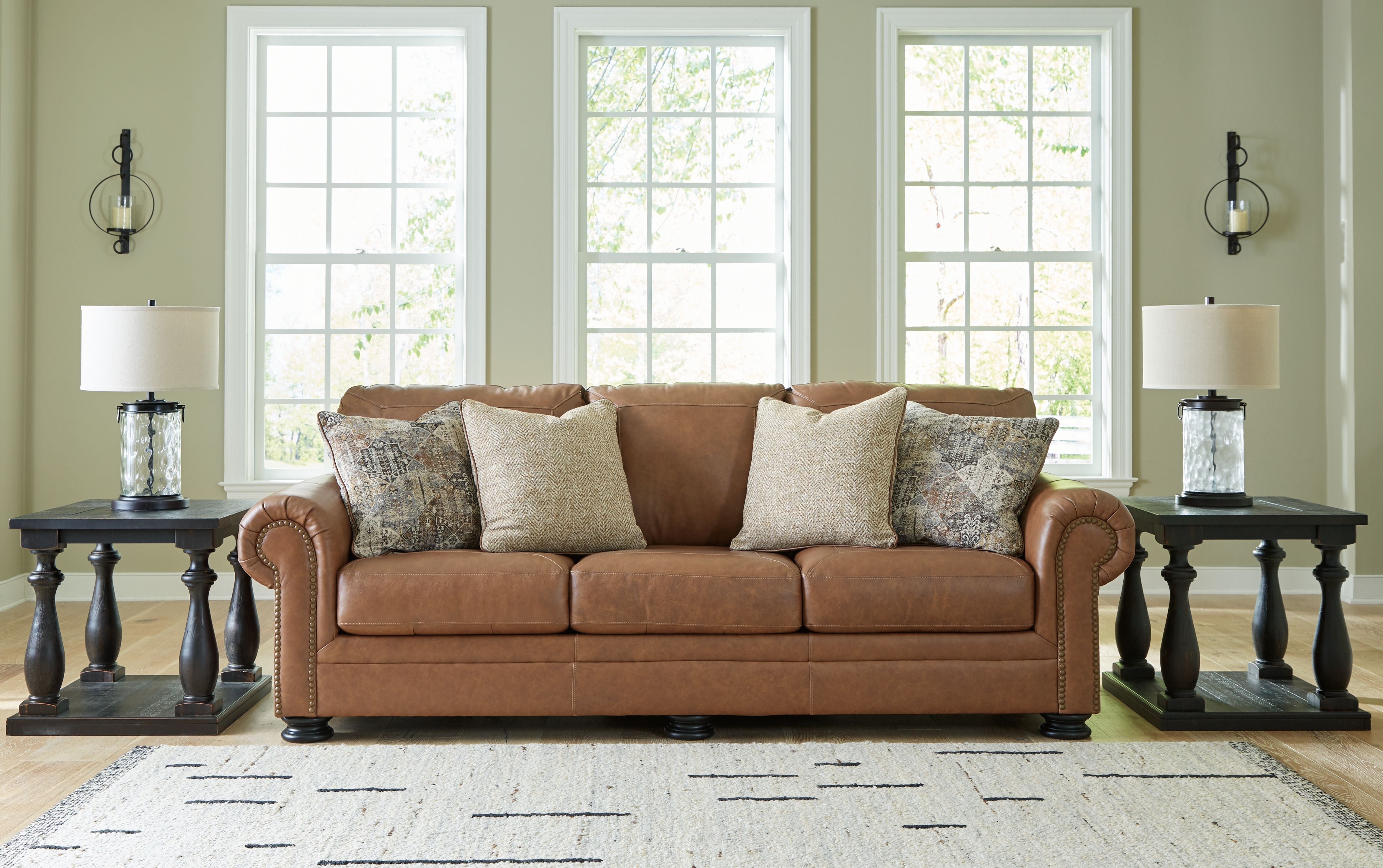 Signature Design by Ashley® Carianna - Caramel - Sofa | Meri Furniture