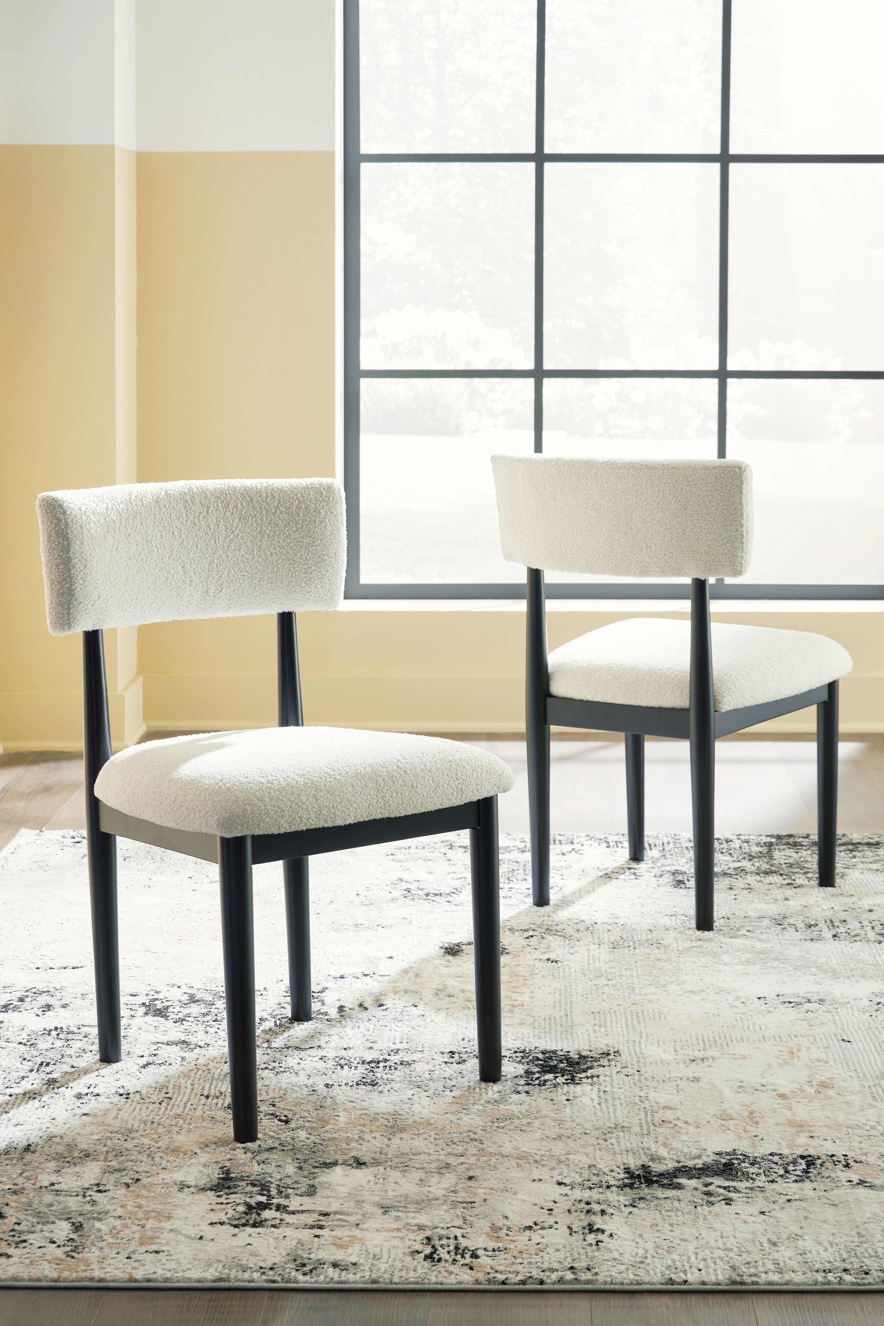 Signature Design by Ashley® Xandrum - White / Black - Dining Upholstered Side Chair (Set of 2) | Meri Furniture