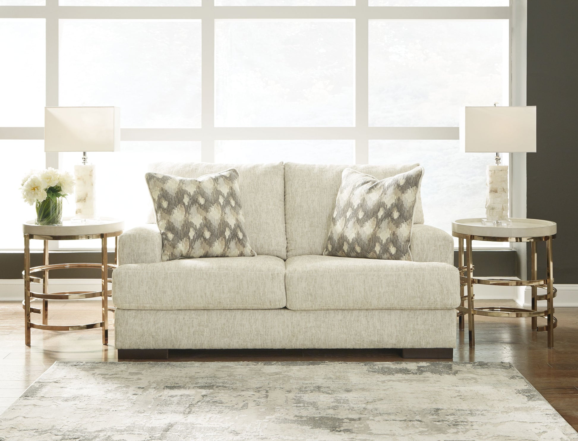 Signature Design by Ashley® Caretti - Parchment - Loveseat | Meri Furniture