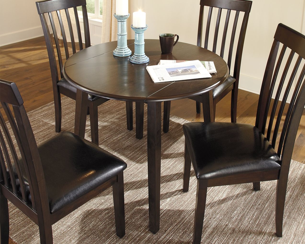 Signature Design by Ashley® Hammis - Dark Brown - Round Drm Drop Leaf Table | Meri Furniture