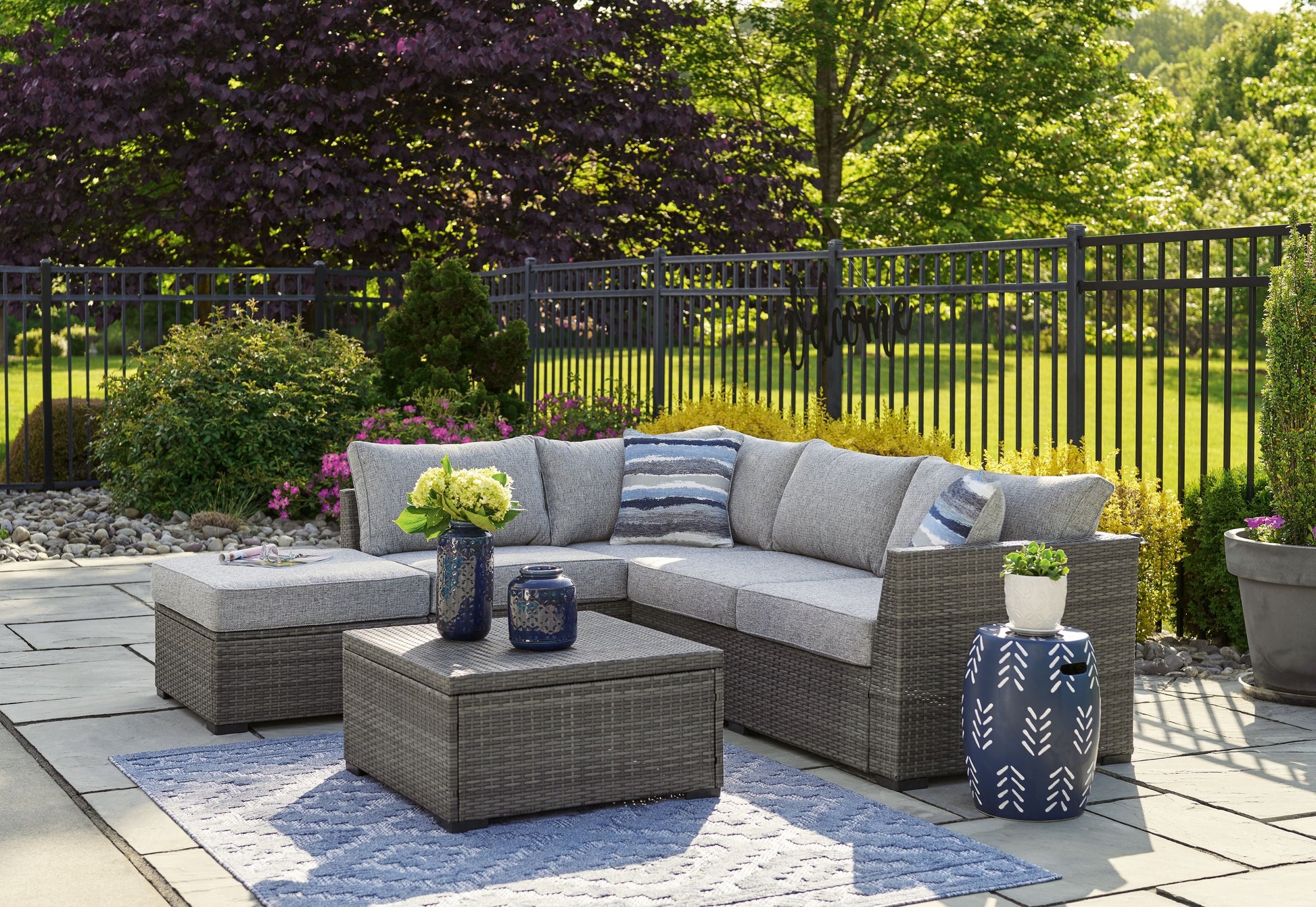 Signature Design by Ashley® Petal Road - Gray - Loveseat Sectional, Ottoman, Table Set (Set of 4) | Meri Furniture