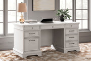 Signature Design by Ashley® Kanwyn - Whitewash - Home Office Desk With Eight Drawers | Meri Furniture