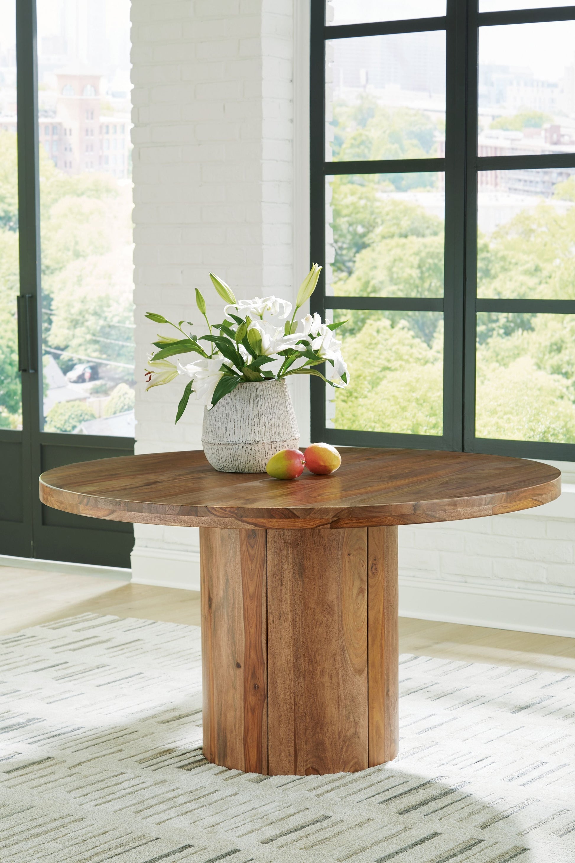 Signature Design by Ashley® Dressonni - Brown - Round Dining Room Table | Meri Furniture