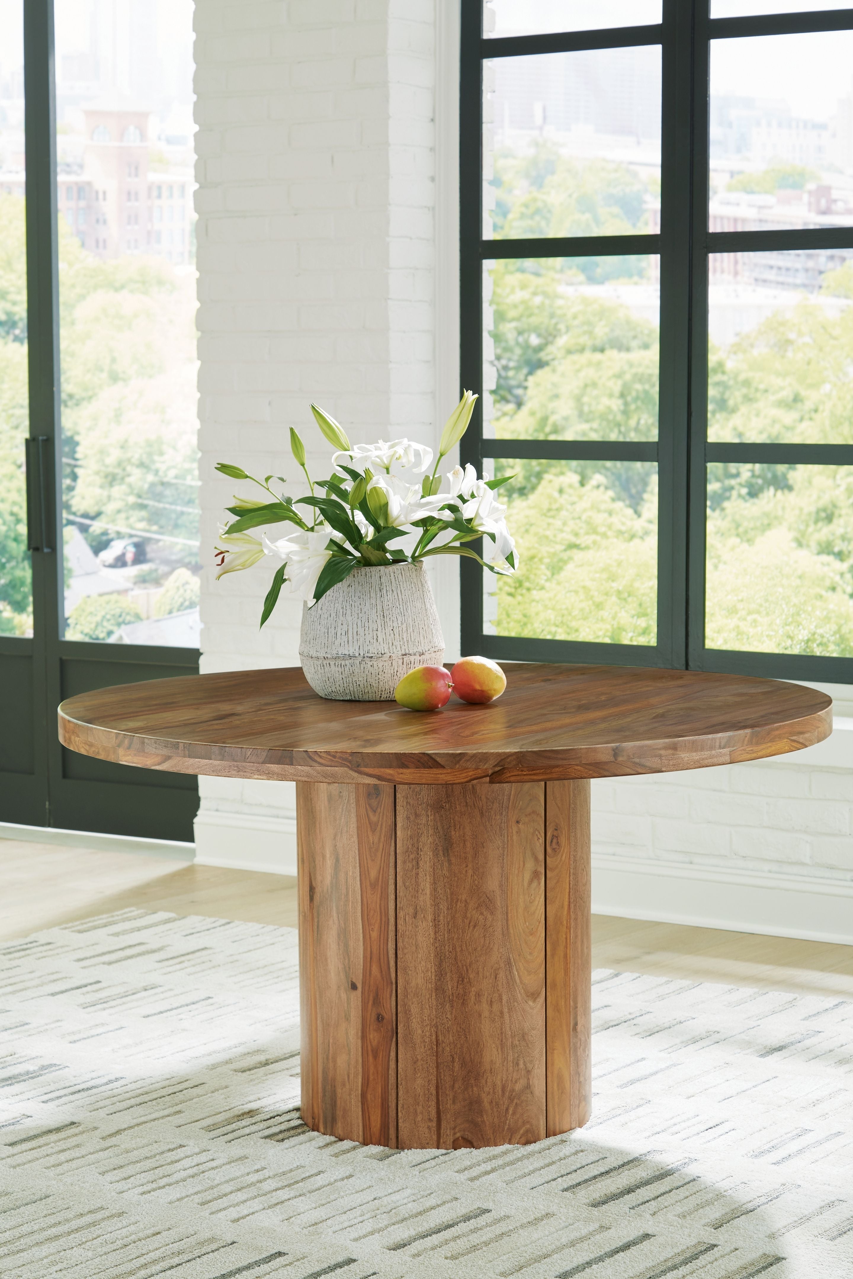 Signature Design by Ashley® Dressonni - Brown - Round Dining Room Table | Meri Furniture