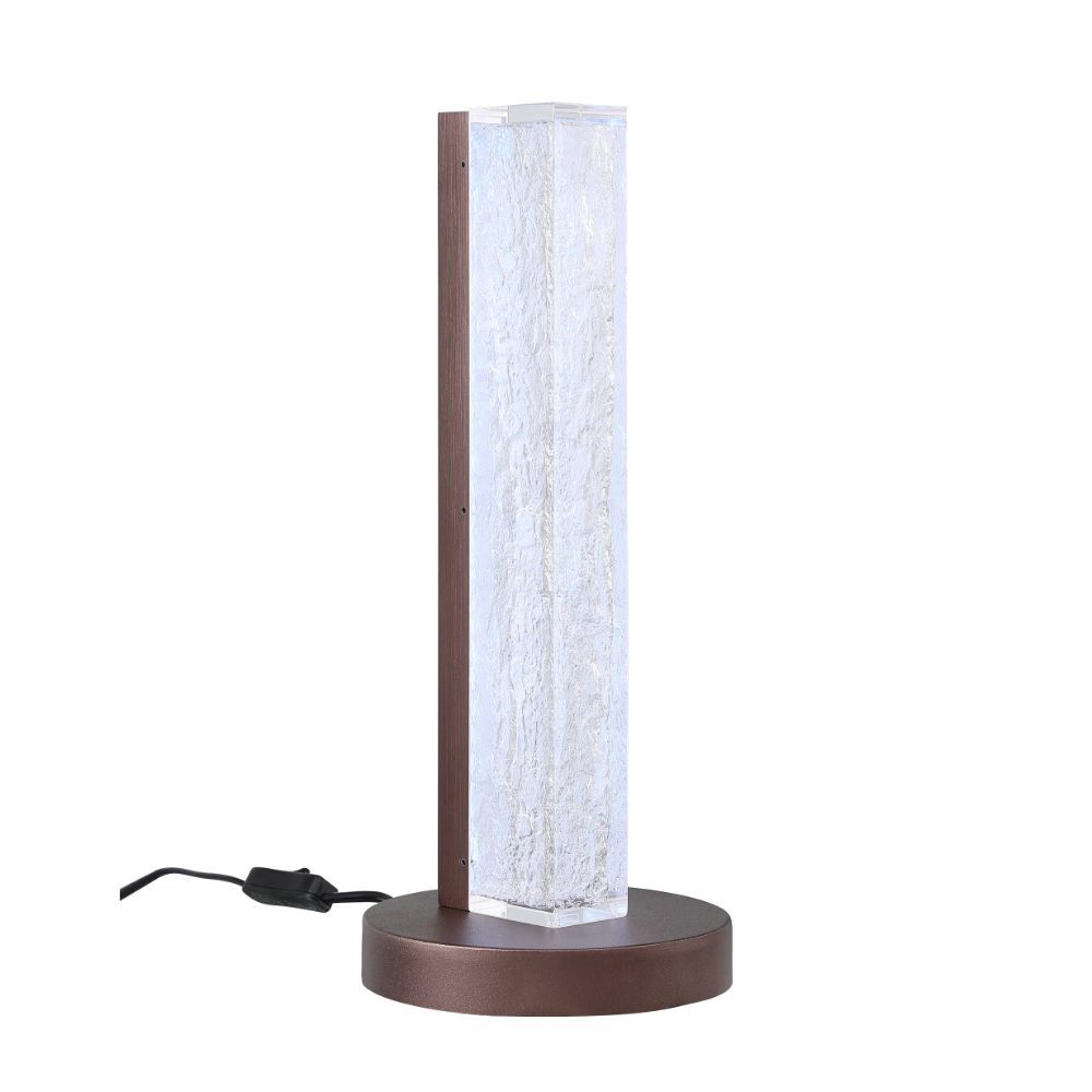 Both a source of light and a beautiful accent piece, this clear resin lamp is not to be missed. The rectangular resin block of the lamp body leans modern, while the sleek finish of the metal base lends glamour to the overall design of this unique lamp.