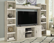 Signature Design by Ashley® Bellaby - Entertainment Center | Meri Furniture