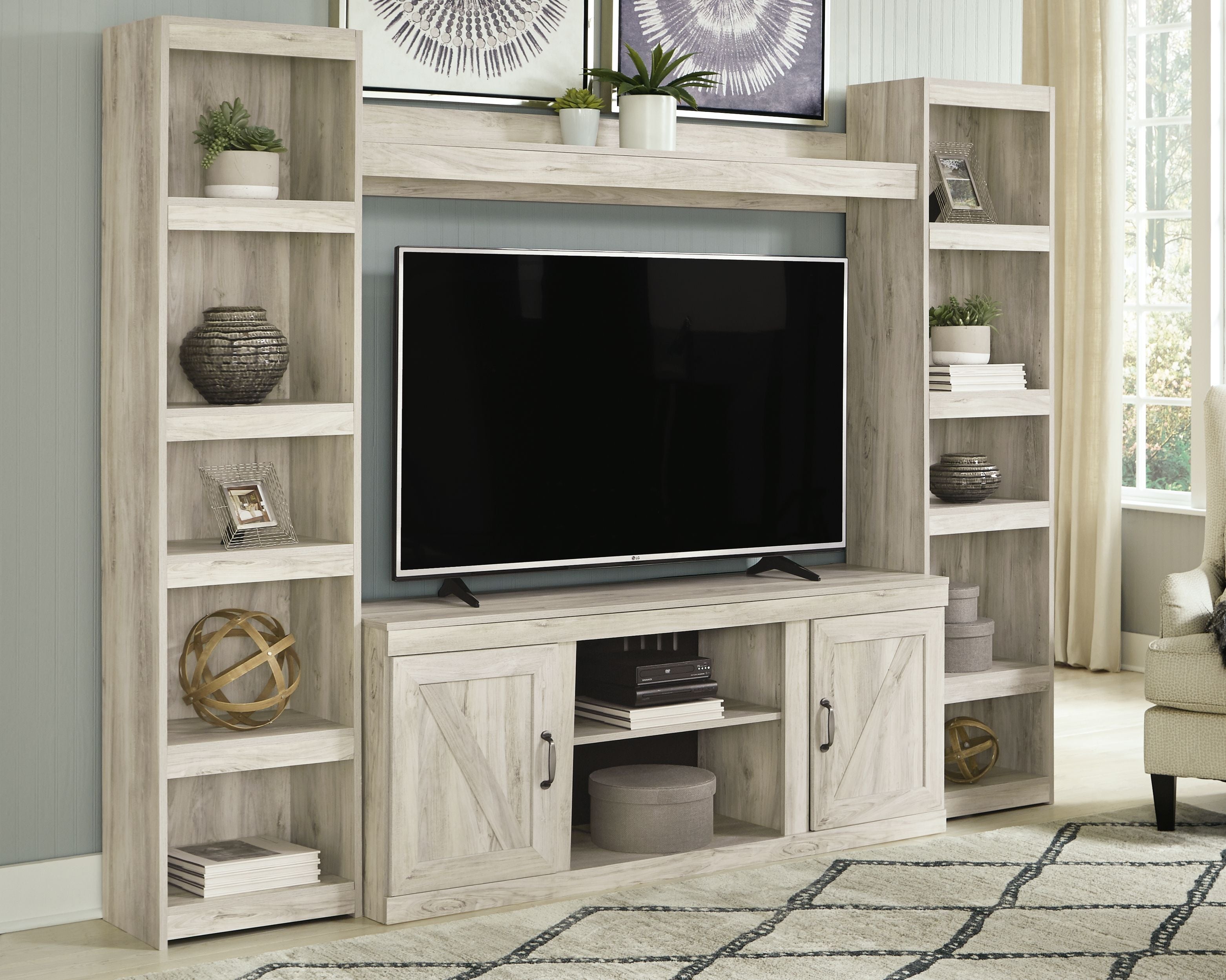 Signature Design by Ashley® Bellaby - Entertainment Center | Meri Furniture