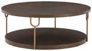 Signature Design by Ashley® Brazburn - Dark Brown / Gold Finish - Round Cocktail Table | Meri Furniture
