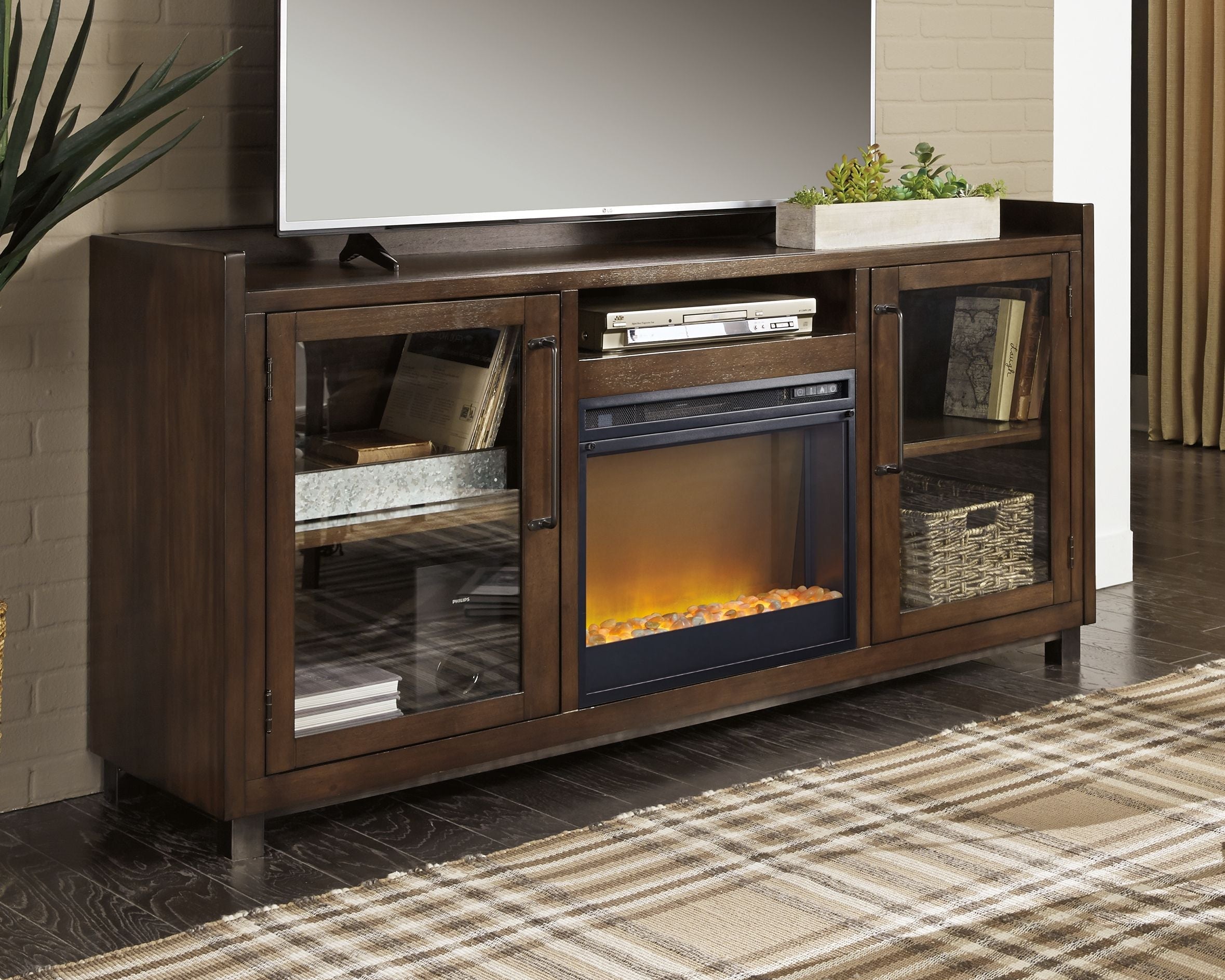 Signature Design by Ashley® Starmore - Brown - 70" TV Stand With Glass/Stone Fireplace Insert | Meri Furniture