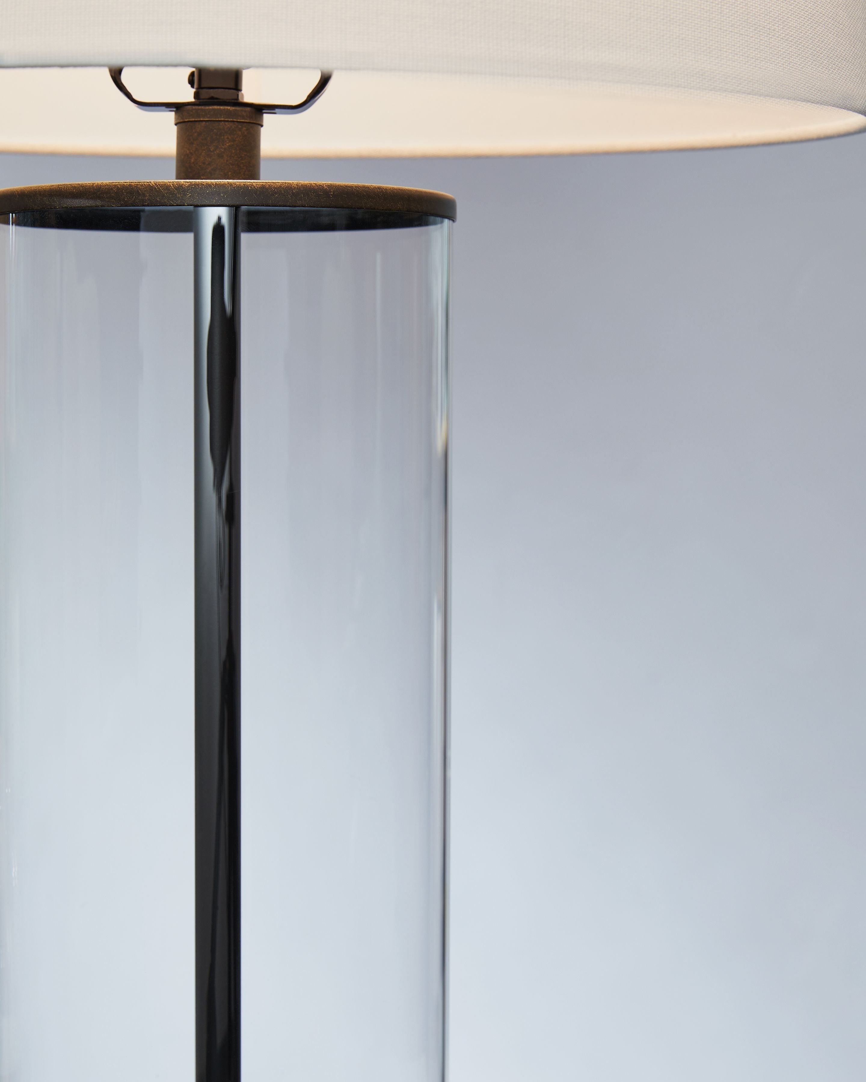 Signature Design by Ashley® Wilmburgh - Clear / Bronze Finish - Glass Table Lamp (Set of 2) | Meri Furniture