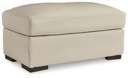 Signature Design by Ashley® Treasure Trove - Almond - Ottoman | Meri Furniture
