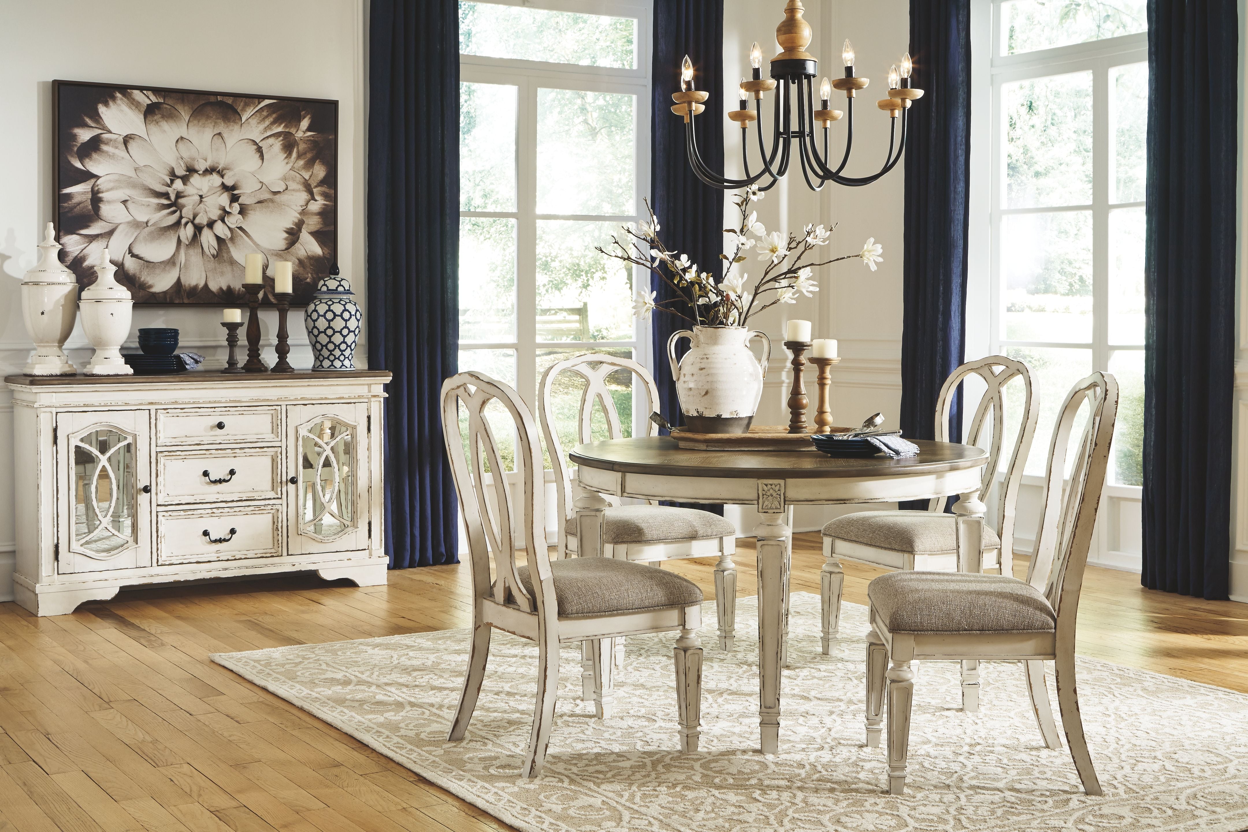 Signature Design by Ashley® Realyn - Oval Dining Table Set | Meri Furniture