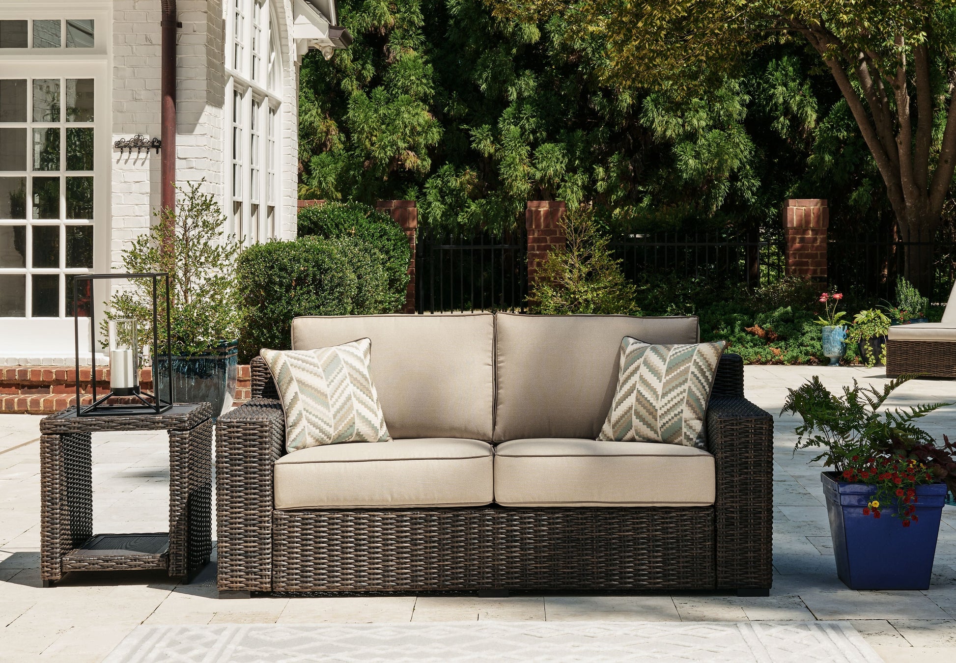 Signature Design by Ashley® Coastline Bay - Brown - Loveseat W/Cushion | Meri Furniture