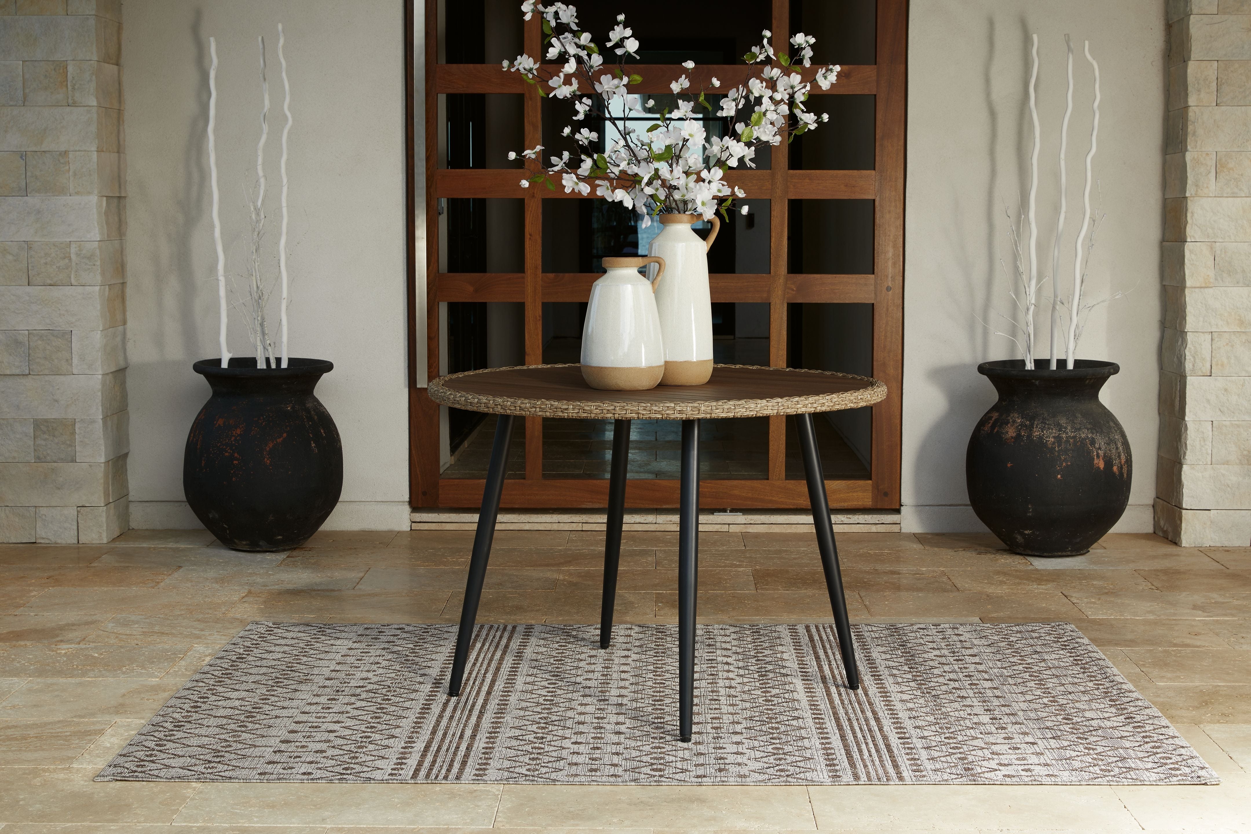 Ashley Furniture Amaris - Brown / Black - Round Dining Table | Meri Furniture