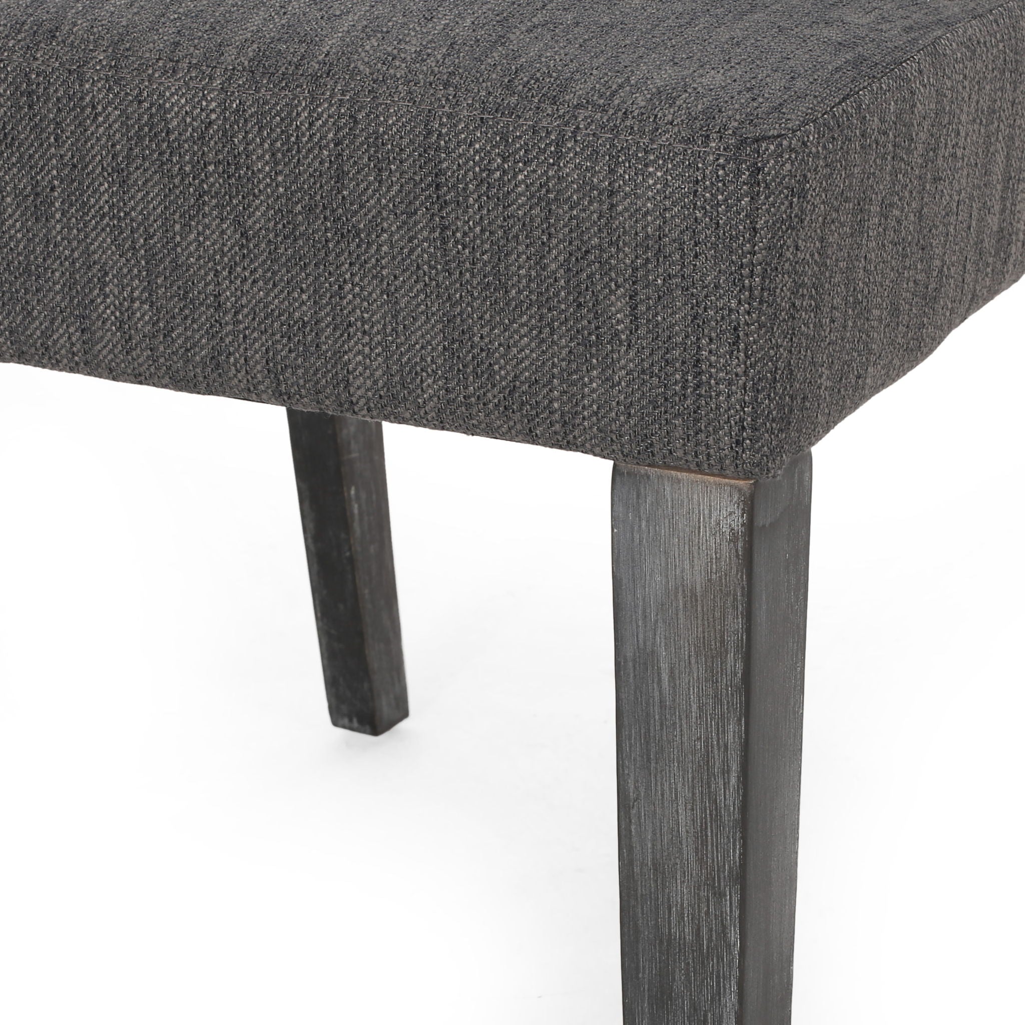 Contemporary Dining Chair With Upholstered Seating And Tapered Legs