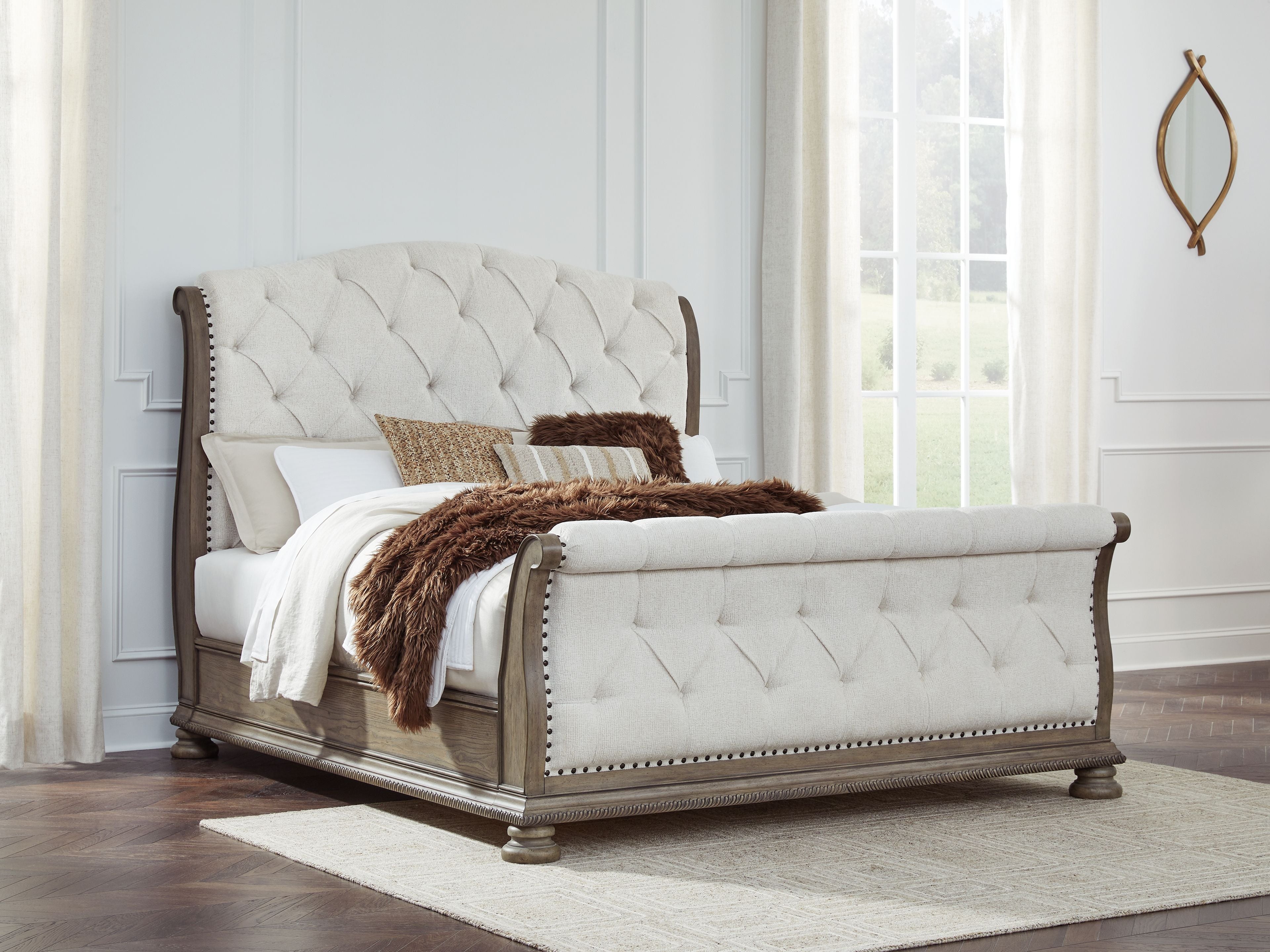 Signature Design by Ashley® Ardenfield - Upholstered Sleigh Bed | Meri Furniture