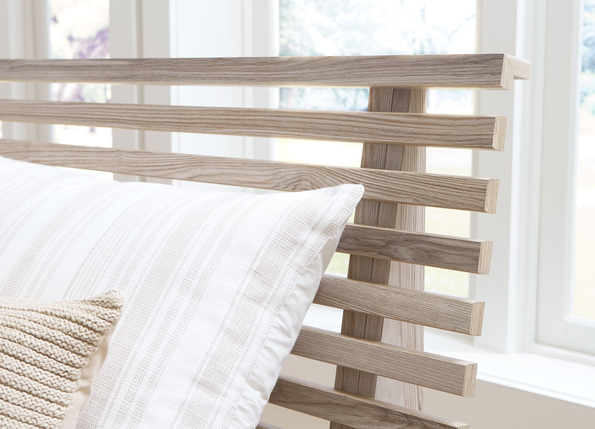 Signature Design by Ashley® Hasbrick - Tan - Queen Slat Panel Bed With Framed Panel Footboard | Meri Furniture