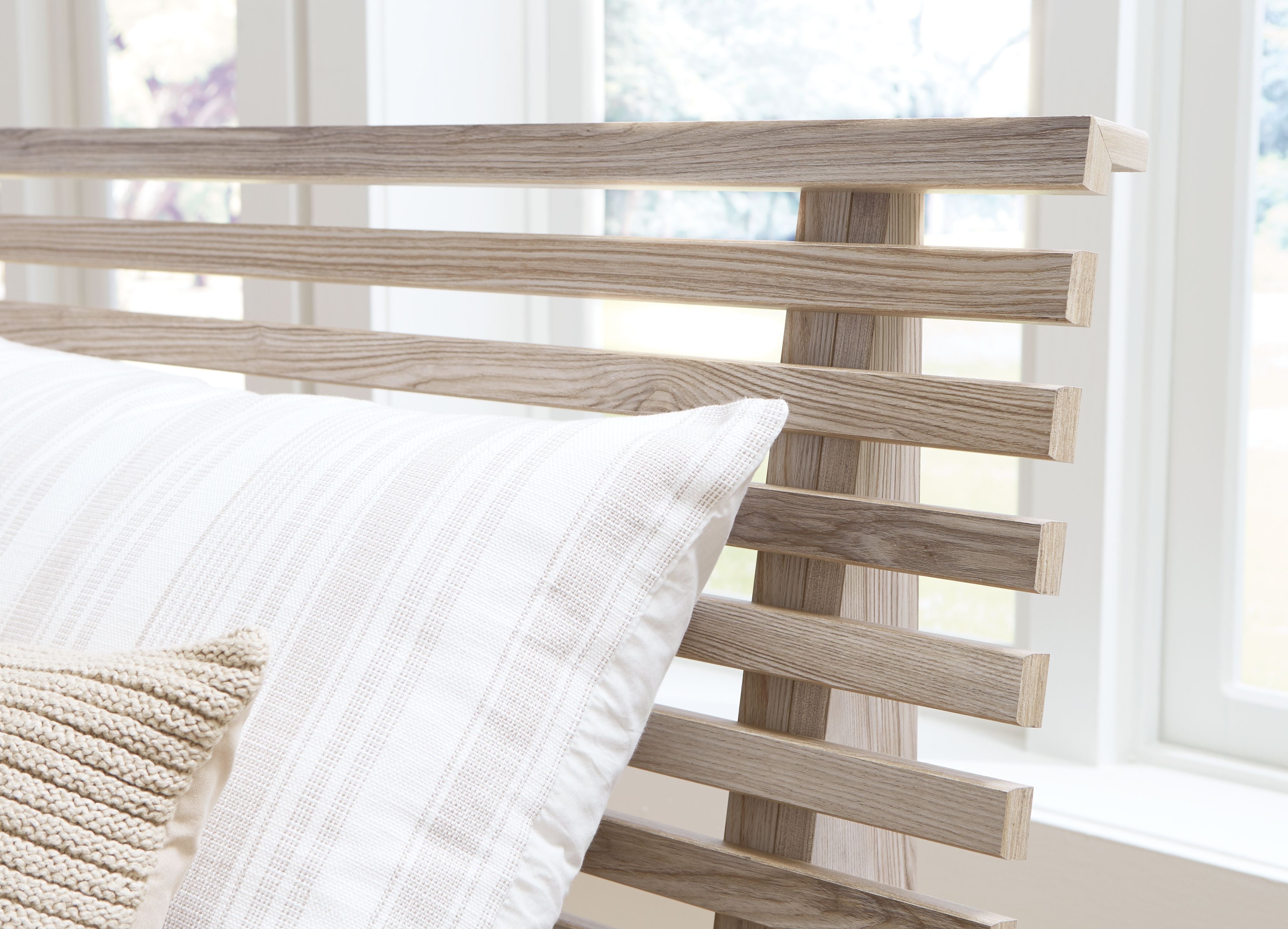 Signature Design by Ashley® Hasbrick - Tan - Queen Slat Panel Bed With Framed Panel Footboard | Meri Furniture