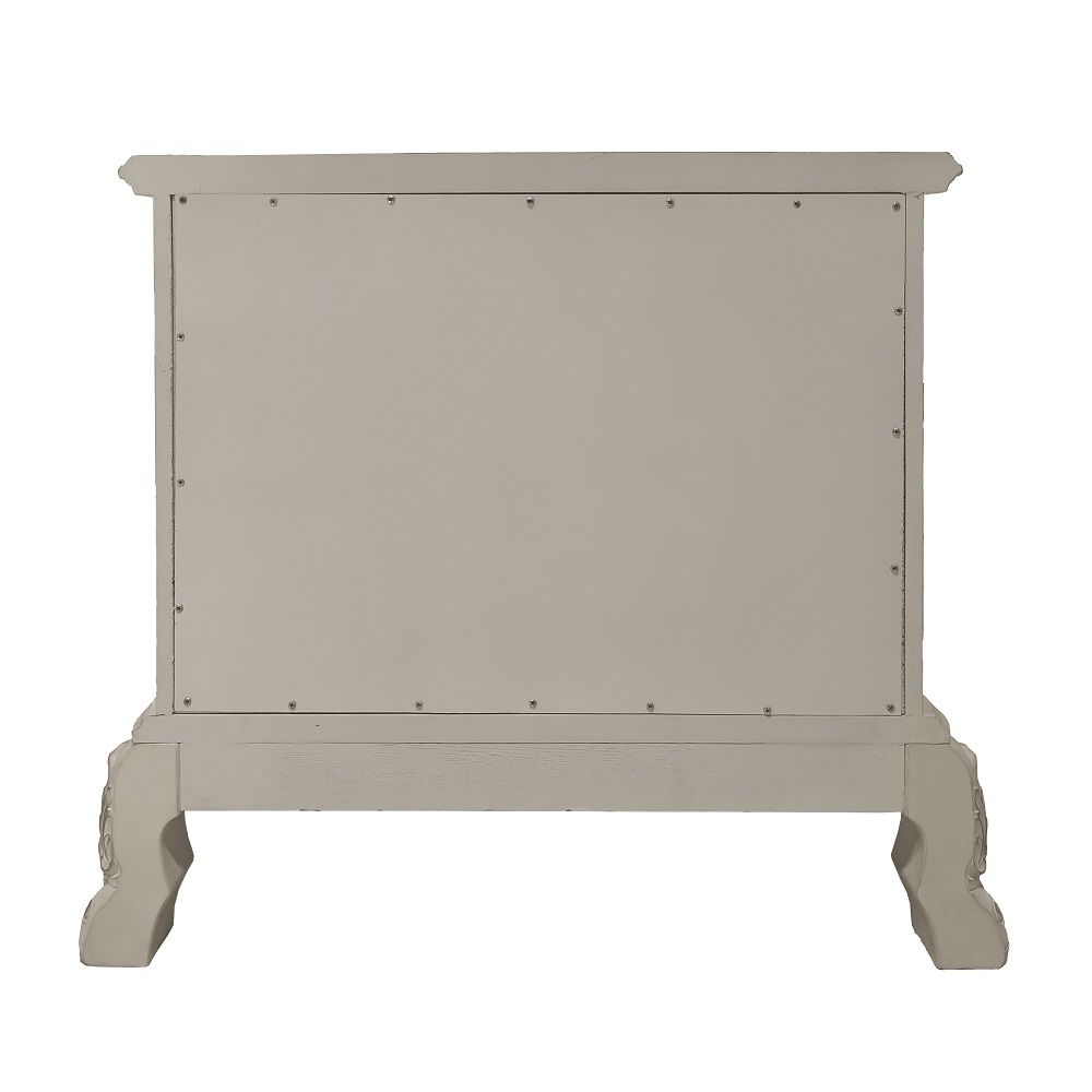 ACME The Dresden Nightstand offers beautiful craftsmanship and artistic carvings. It features solid hardwood with two drawers for storage with coordinating carvings. The drawers feature dove tail construction and are decorated with antique brass hardware.