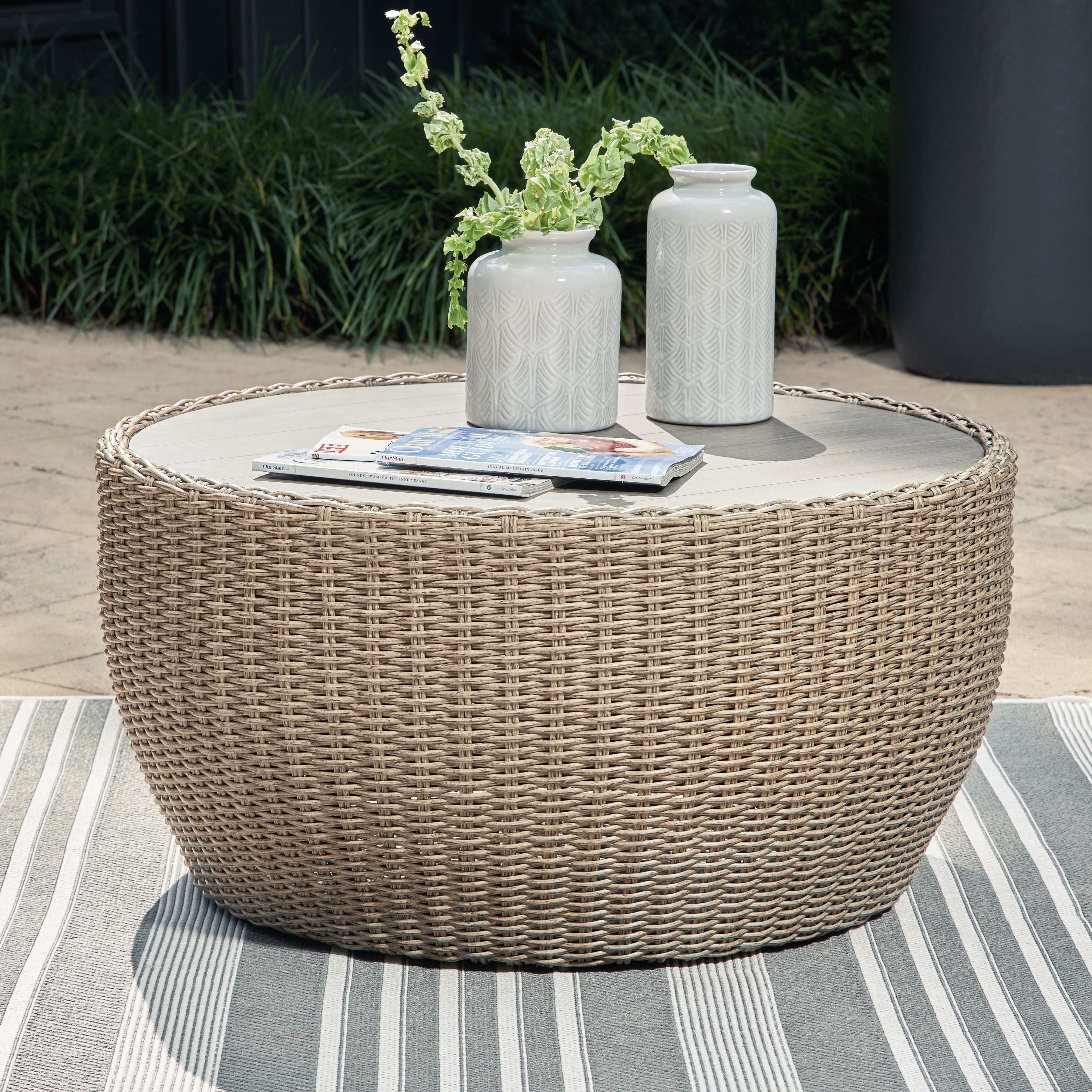 Signature Design by Ashley® Danson - Beige - Round Cocktail Table | Meri Furniture