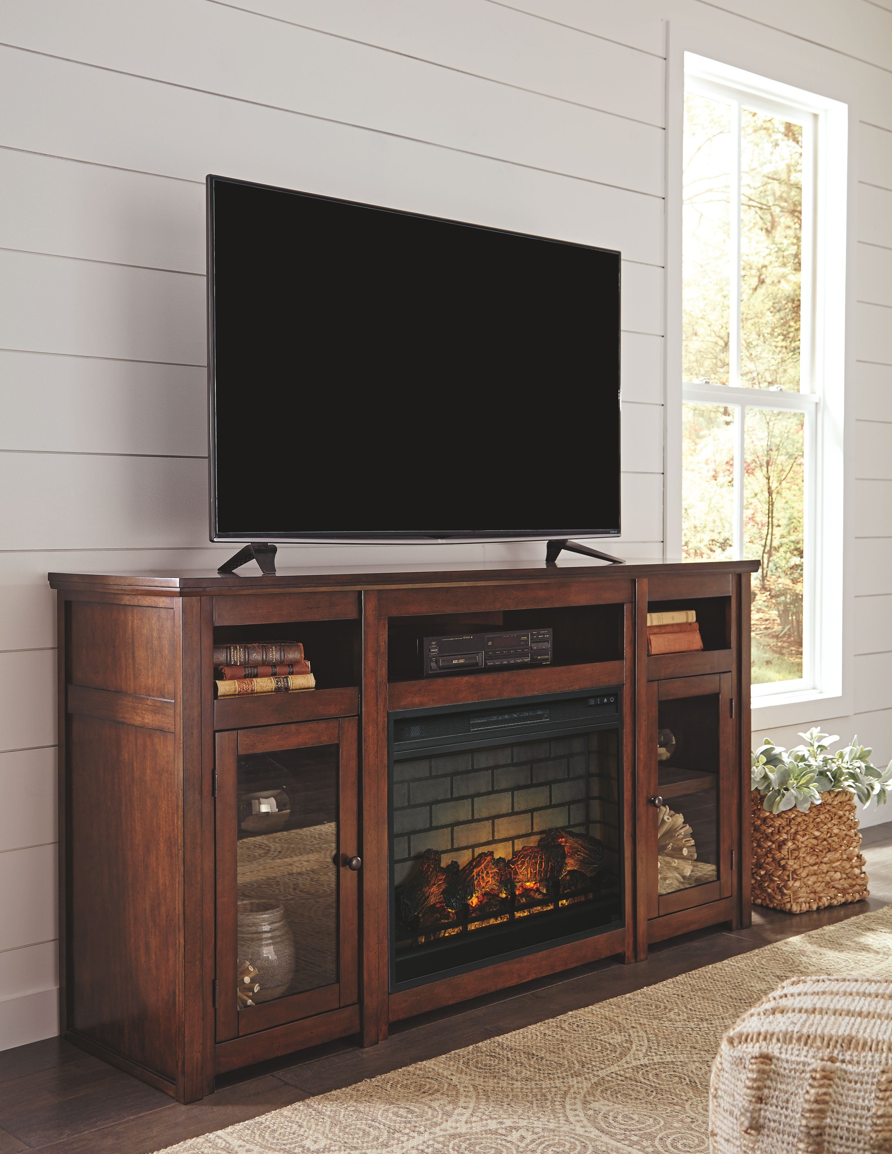 Signature Design by Ashley® Harpan - Reddish Brown - 2 Pc. - 72" TV Stand With Electric Infrared Fireplace Insert | Meri Furniture