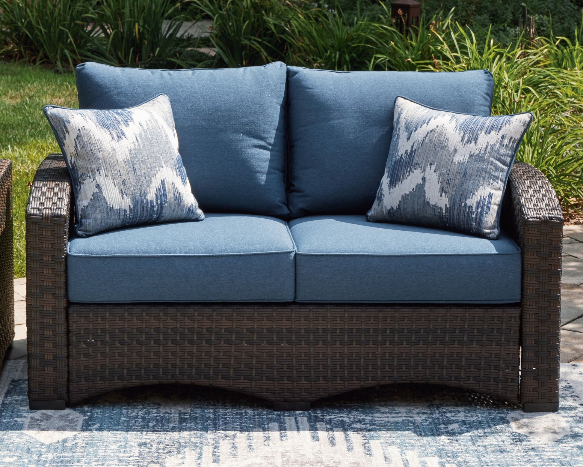 Signature Design by Ashley® Windglow - Blue / Brown - Loveseat With Cushion | Meri Furniture