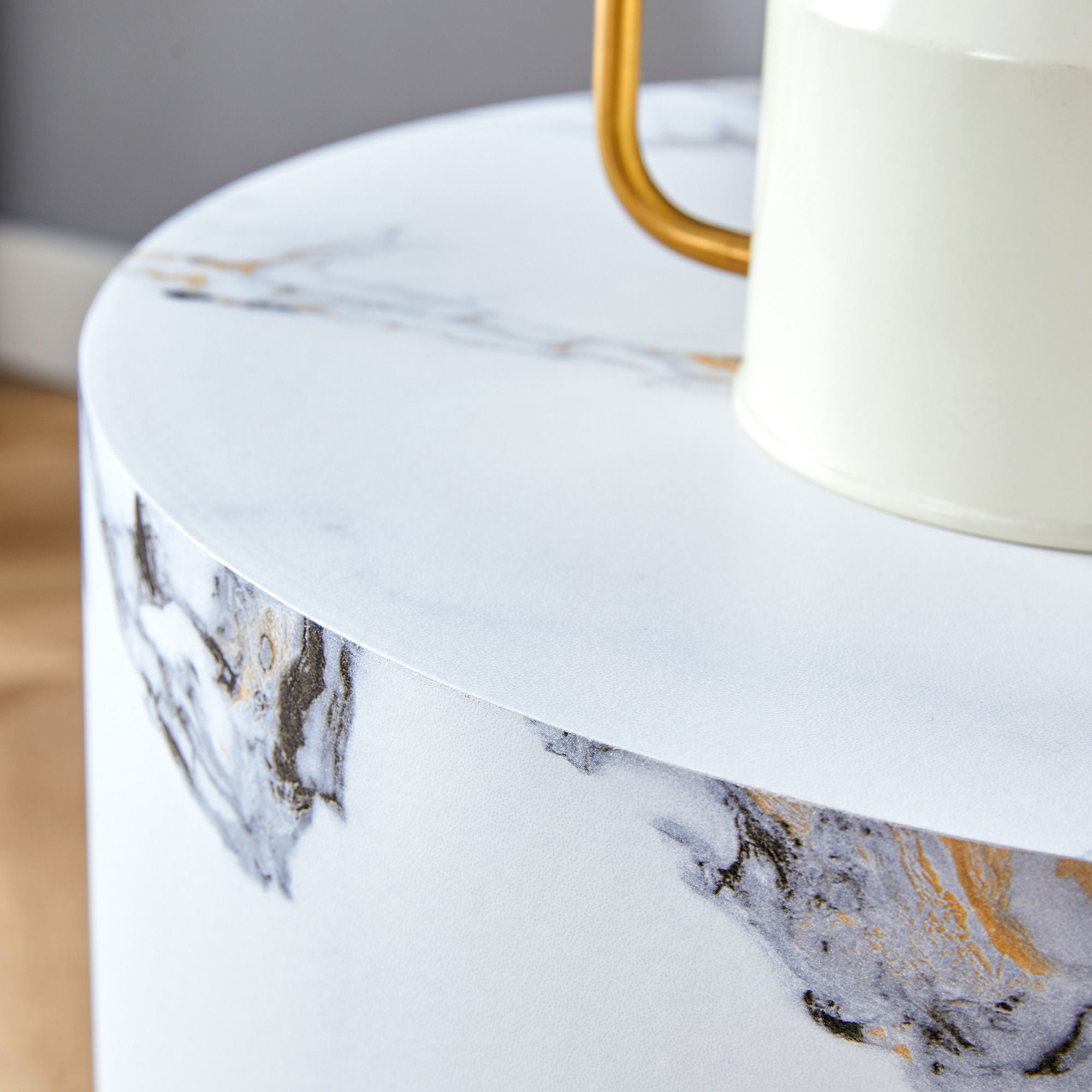 Elegant Cylindrical Table With Patterned Design For Versatile Use - White