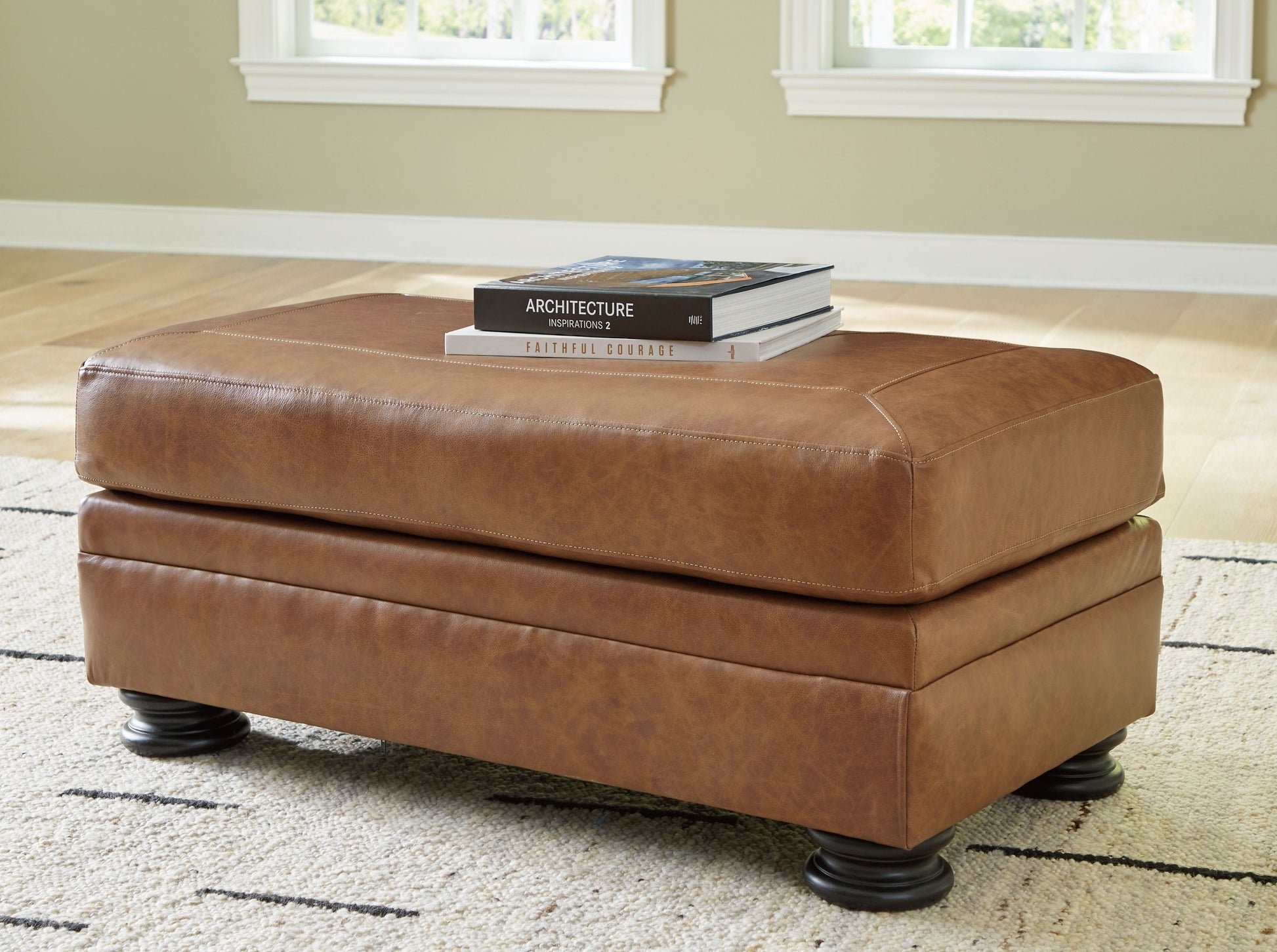 Signature Design by Ashley® Carianna - Caramel - Ottoman | Meri Furniture