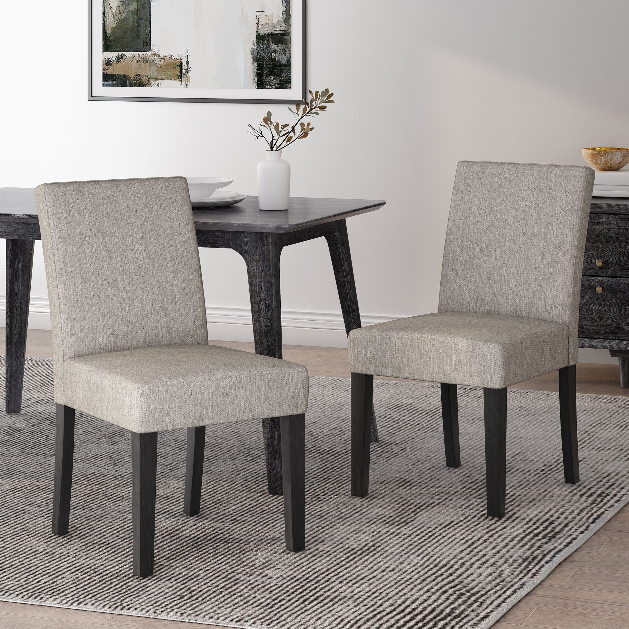 Contemporary Dining Chair With Upholstered Seating And Tapered Legs