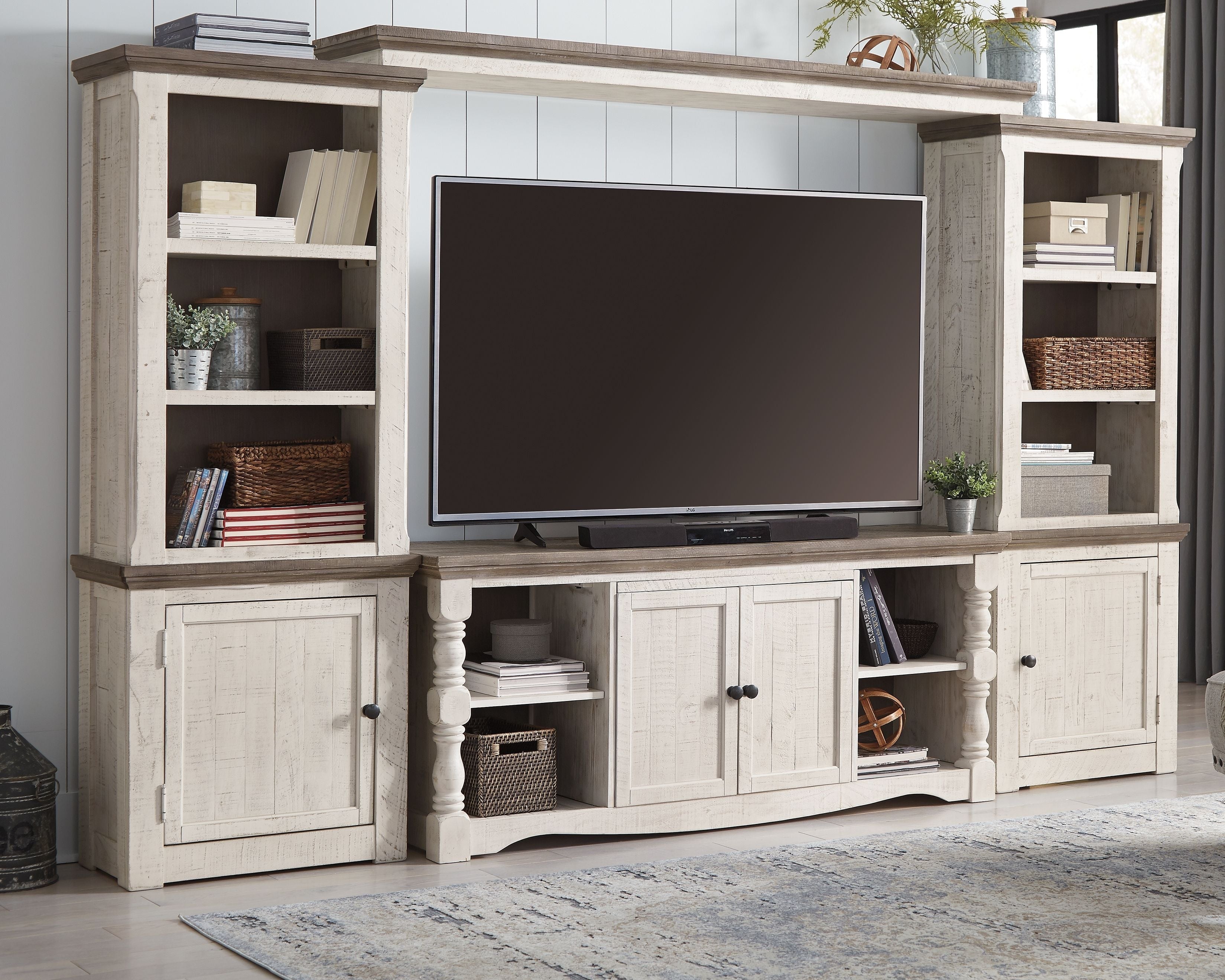 Signature Design by Ashley® Havalance - Brown / Beige - 4 Pc. - Entertainment Center - 67" TV Stand | Meri Furniture