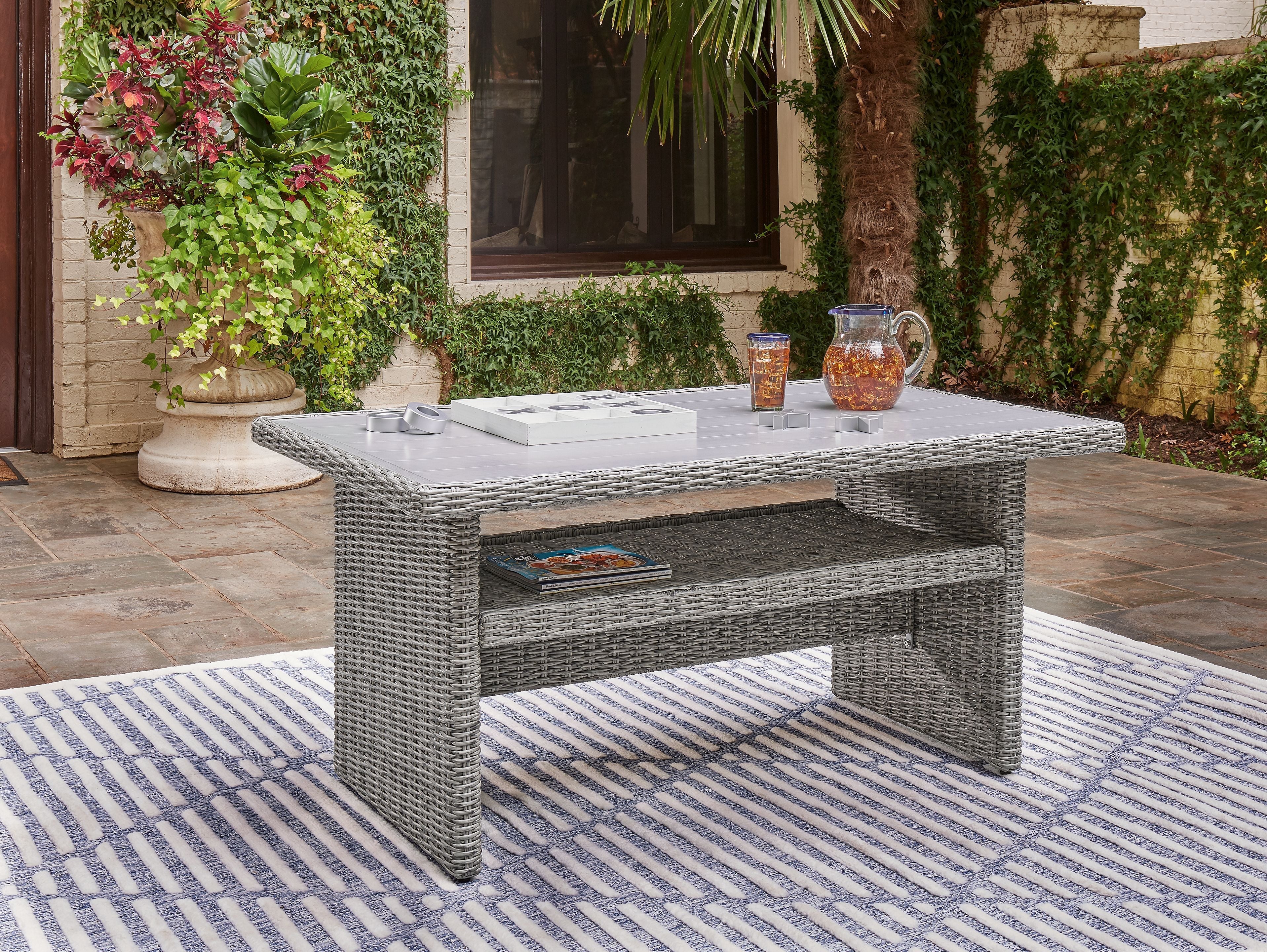 Signature Design by Ashley® Naples Beach - Light Gray - Rect Multi-use Table | Meri Furniture