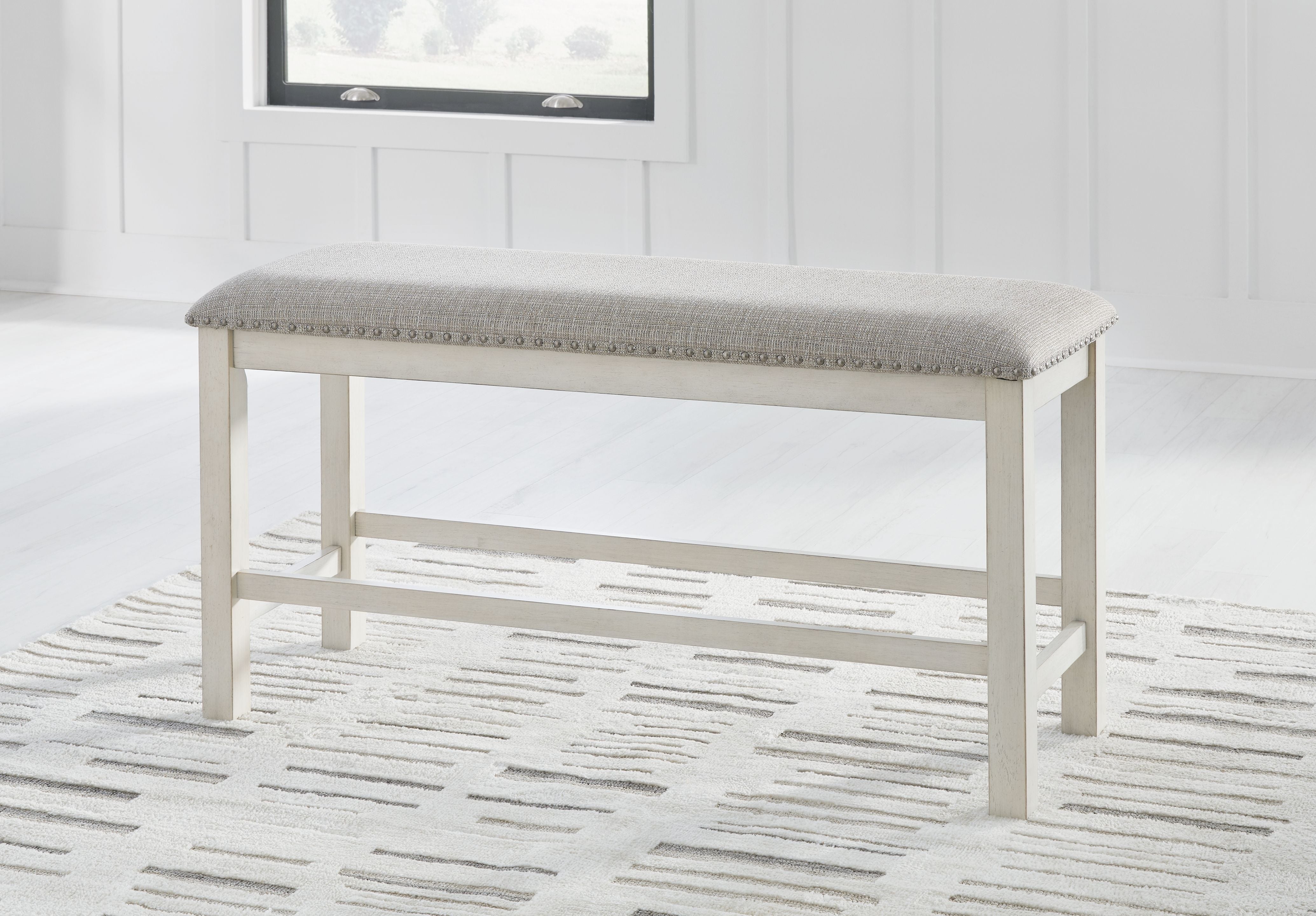 Signature Design by Ashley® Robbinsdale - Antique White - Dbl Counter Height Upholstered Dining Bench | Meri Furniture