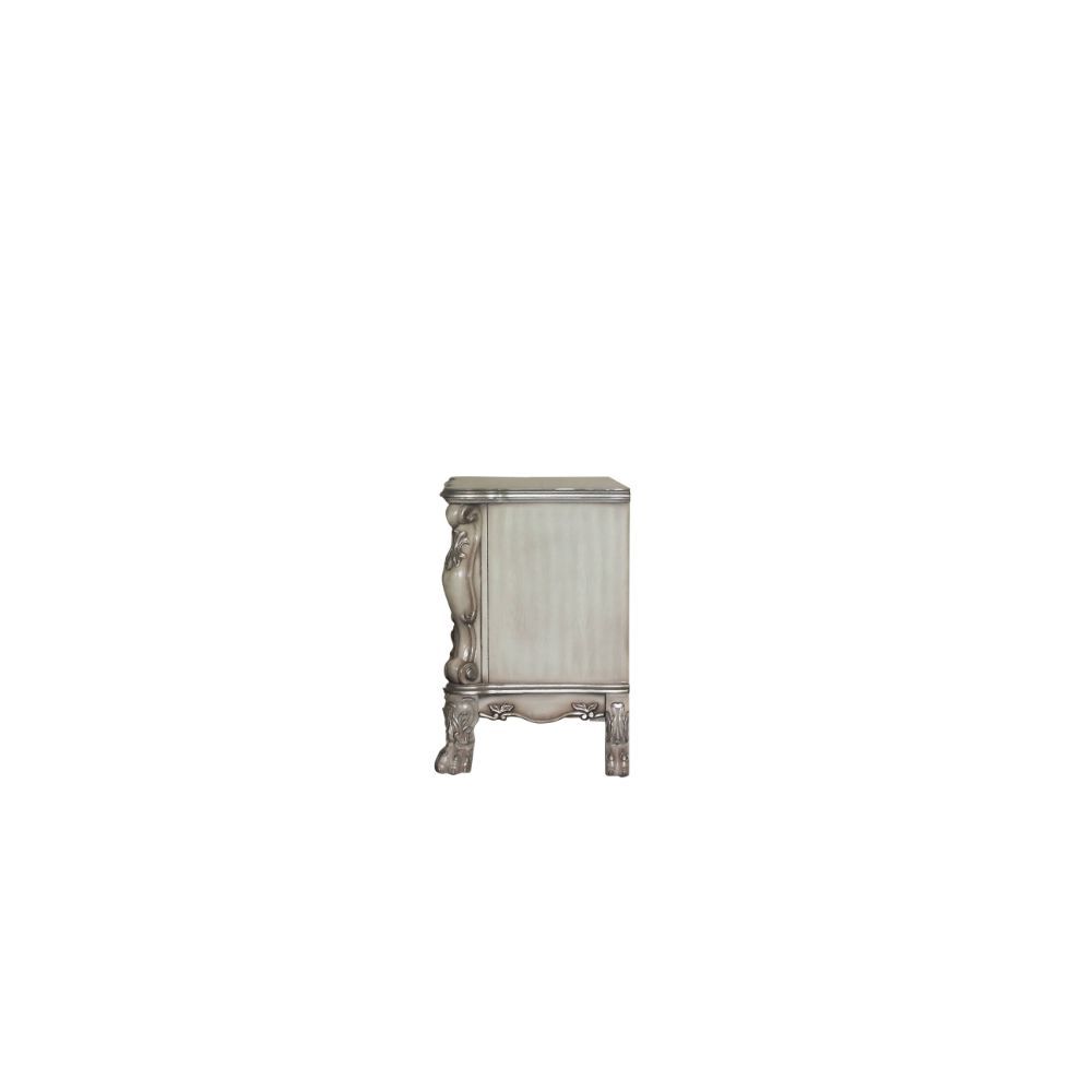 The Dresden Nightstand offers beautiful craftsmanship and artistic carvings. It features solid hardwood with two drawers for storage with coordinating carvings. The drawers feature dove tail construction and are decorated with antique brass hardware.