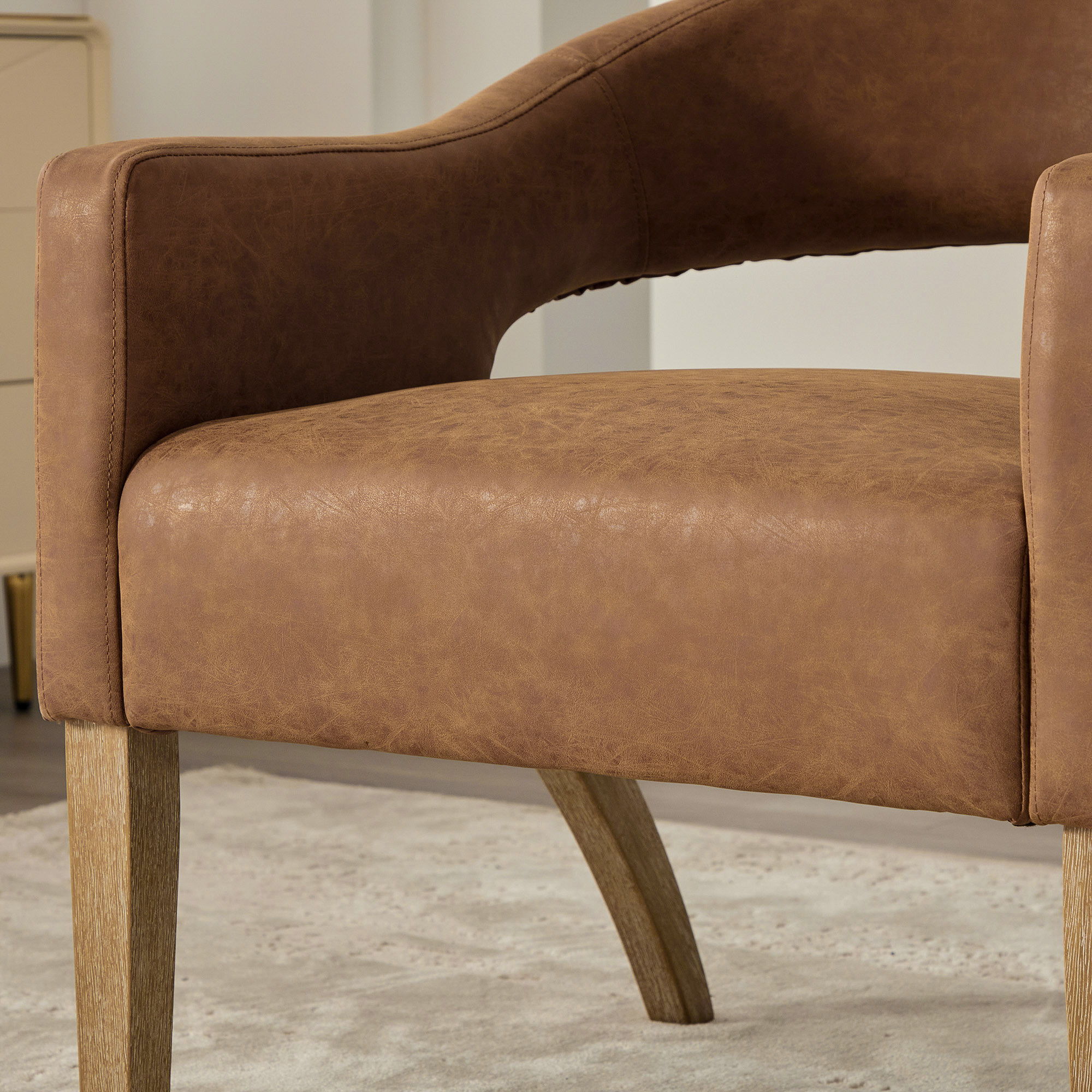 Upholstered Open Back Armchair With Weathered Rubberwood Legs