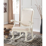 The Sharan rocking chair features a French provincial style with scalloped apron, cabriole front legs, expertly crafted in antique finish.