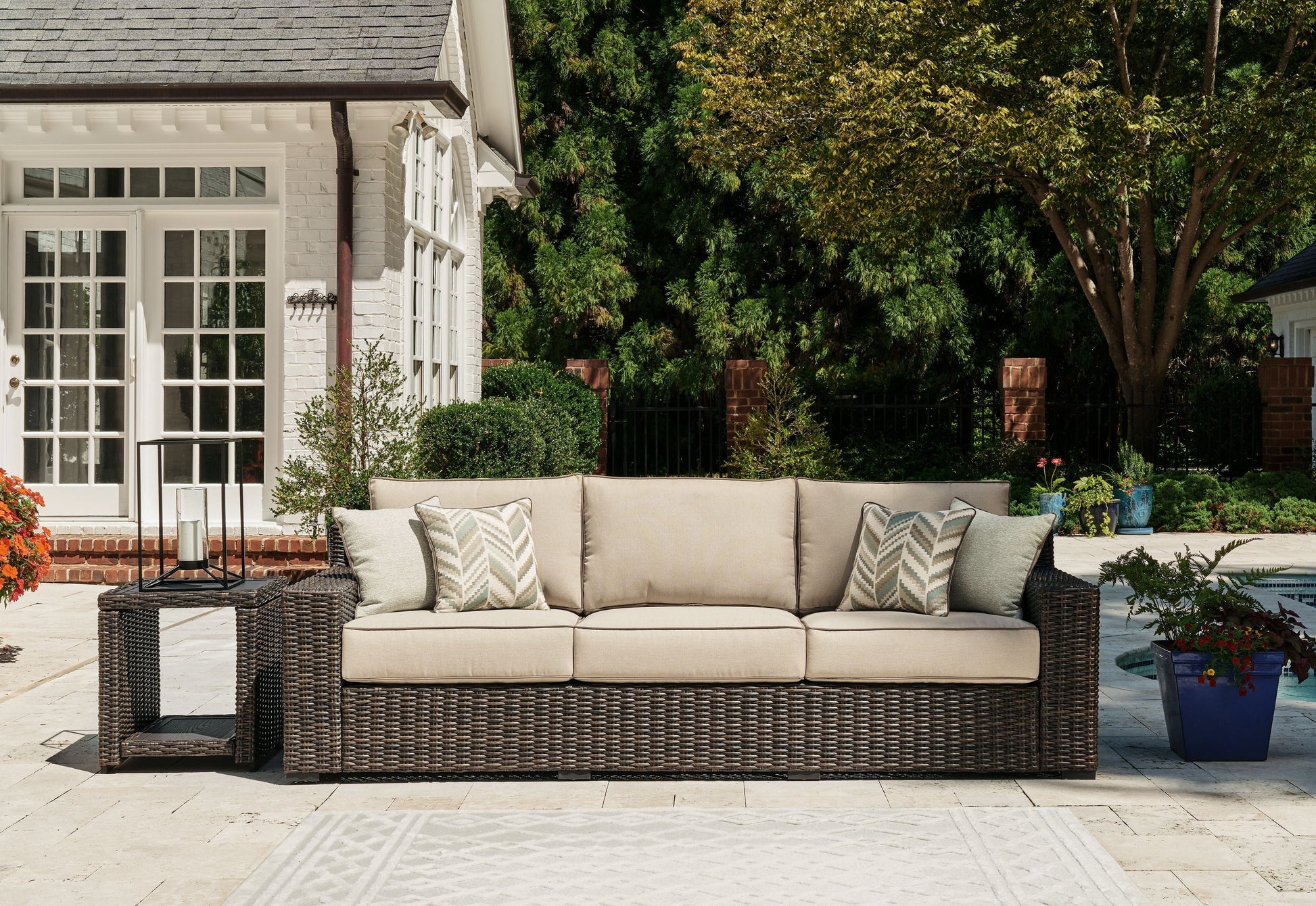 Signature Design by Ashley® Coastline Bay - Brown - Sofa With Cushion | Meri Furniture
