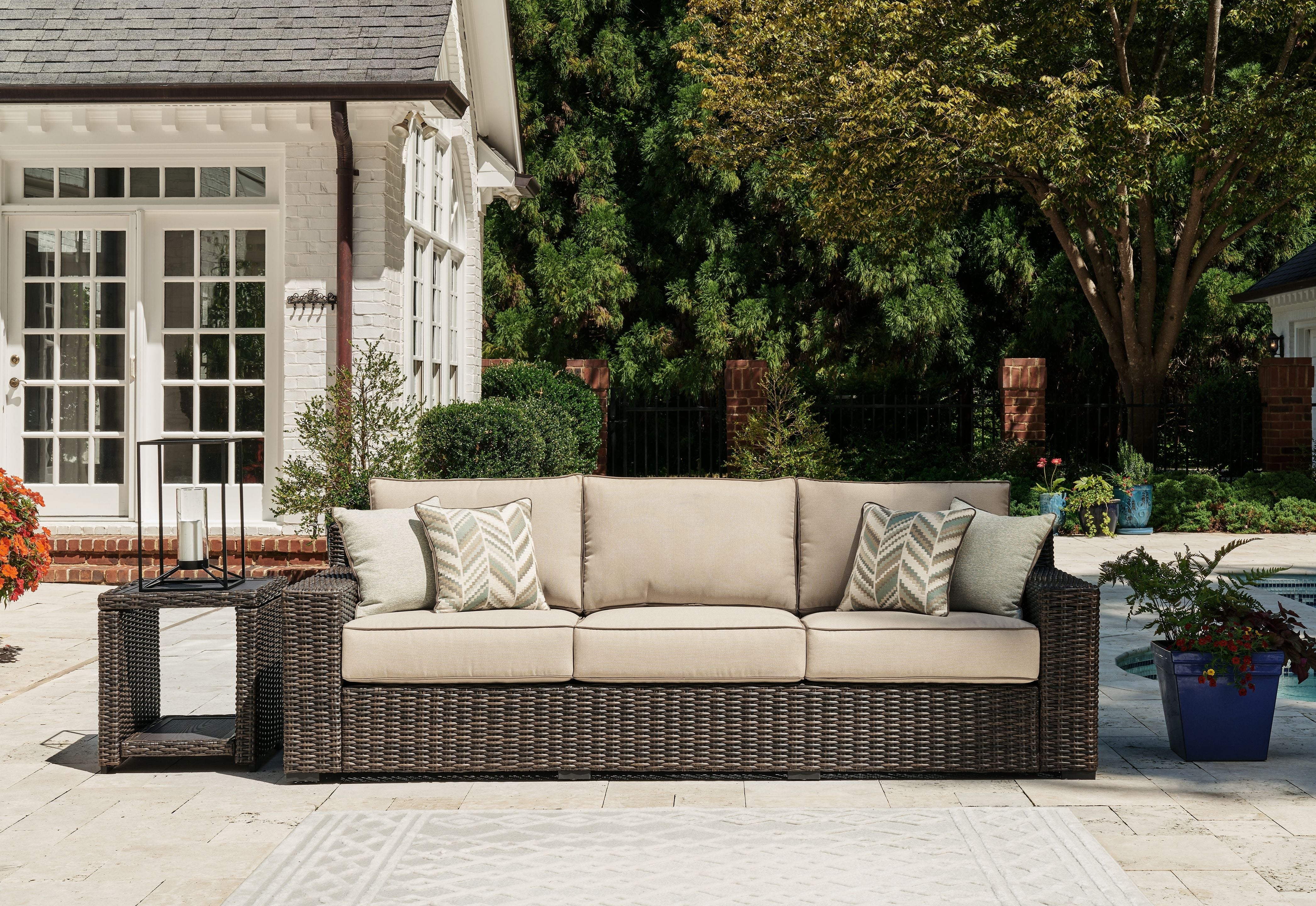 Signature Design by Ashley® Coastline Bay - Brown - Sofa With Cushion | Meri Furniture