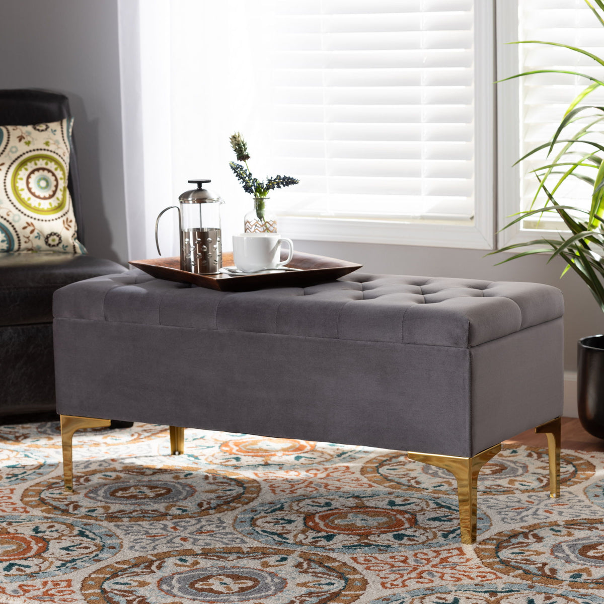 Valere Glam and Luxe Grey Velvet Fabric Upholstered Gold Finished Button Tufted Storage Ottoman