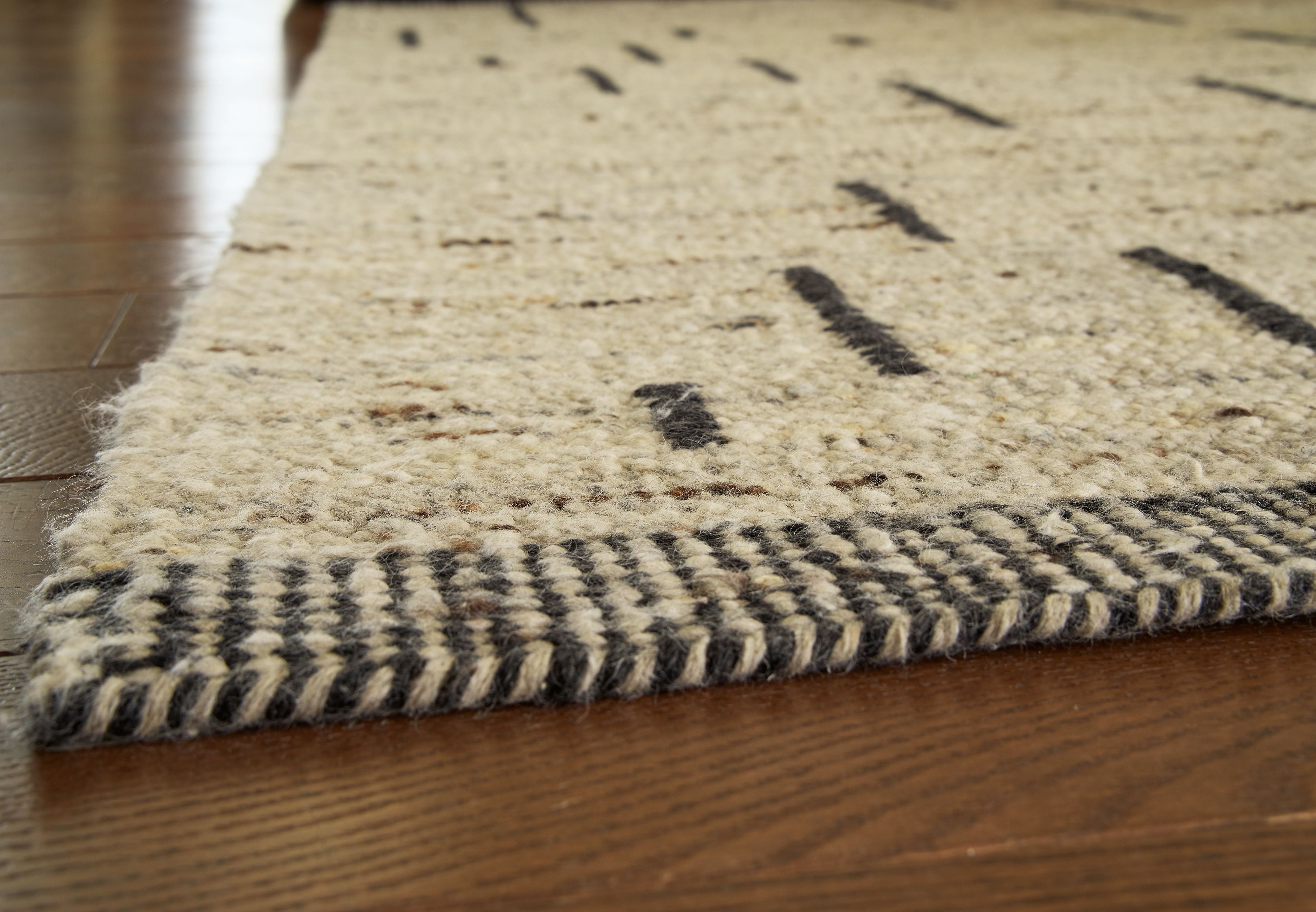 Signature Design by Ashley® Mortis - Area Rug | Meri Furniture