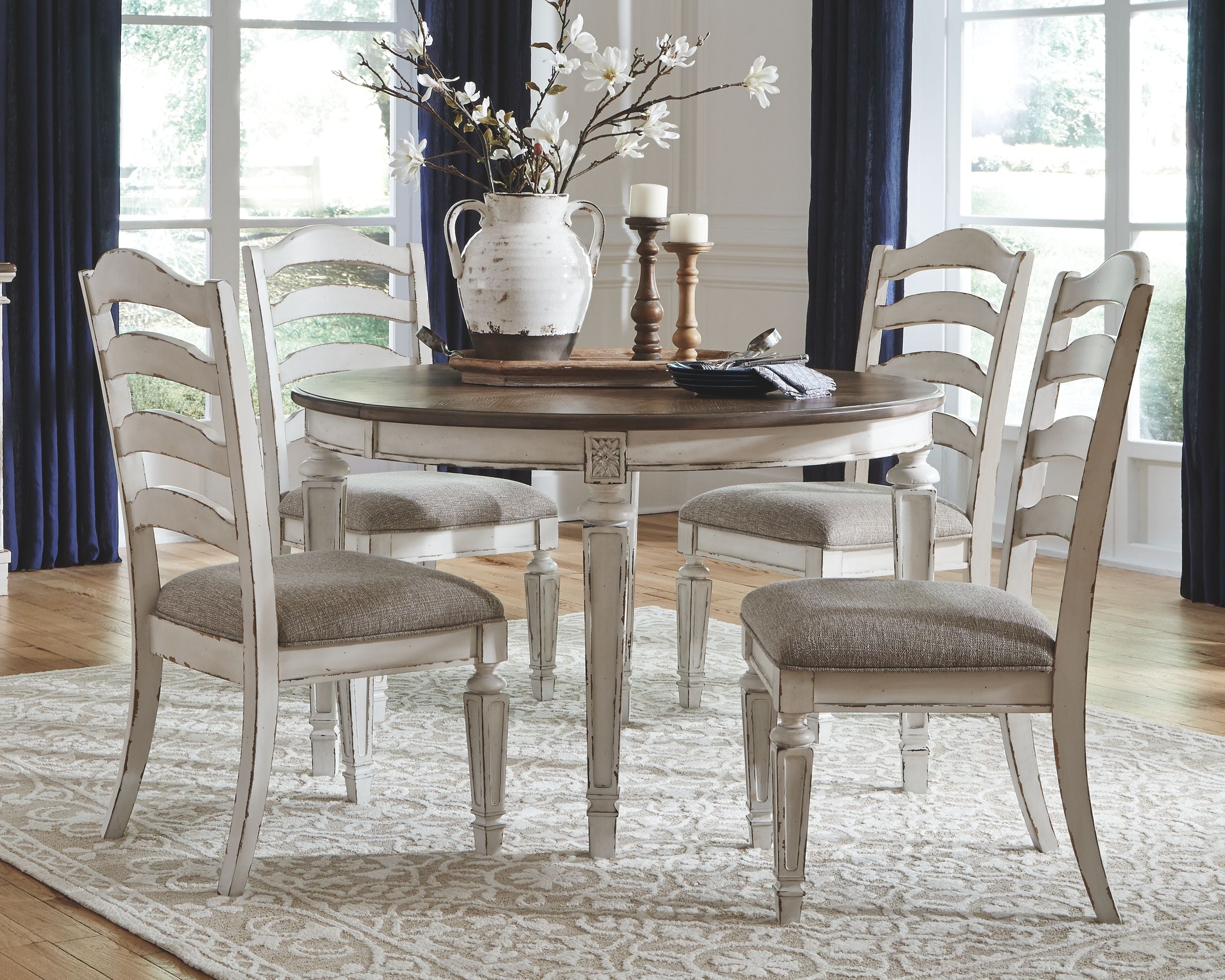 Signature Design by Ashley® Realyn - Oval Dining Table Set | Meri Furniture