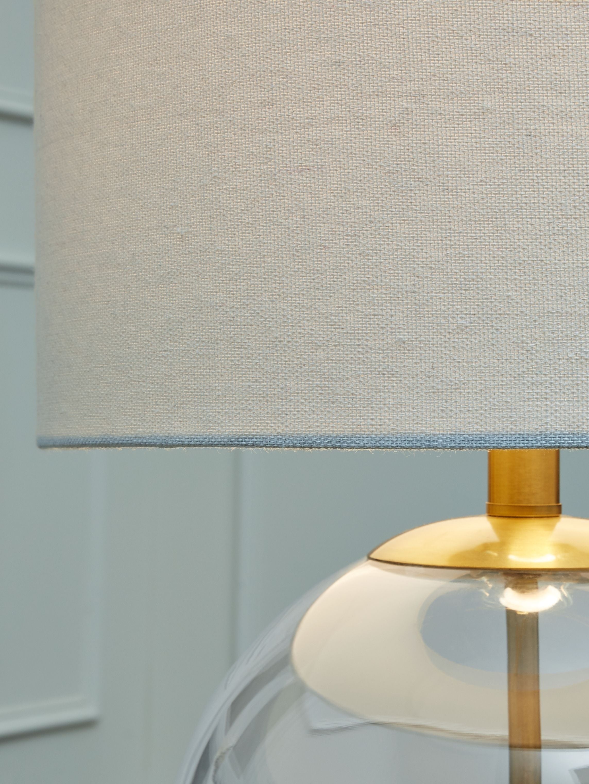 Signature Design by Ashley® Samder - White - Glass Table Lamp | Meri Furniture