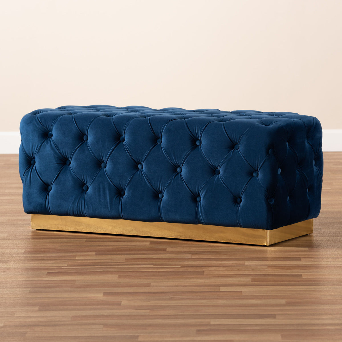 Corrine Glam and Luxe Navy Blue Velvet Fabric Upholstered and Gold PU Leather Ottoman