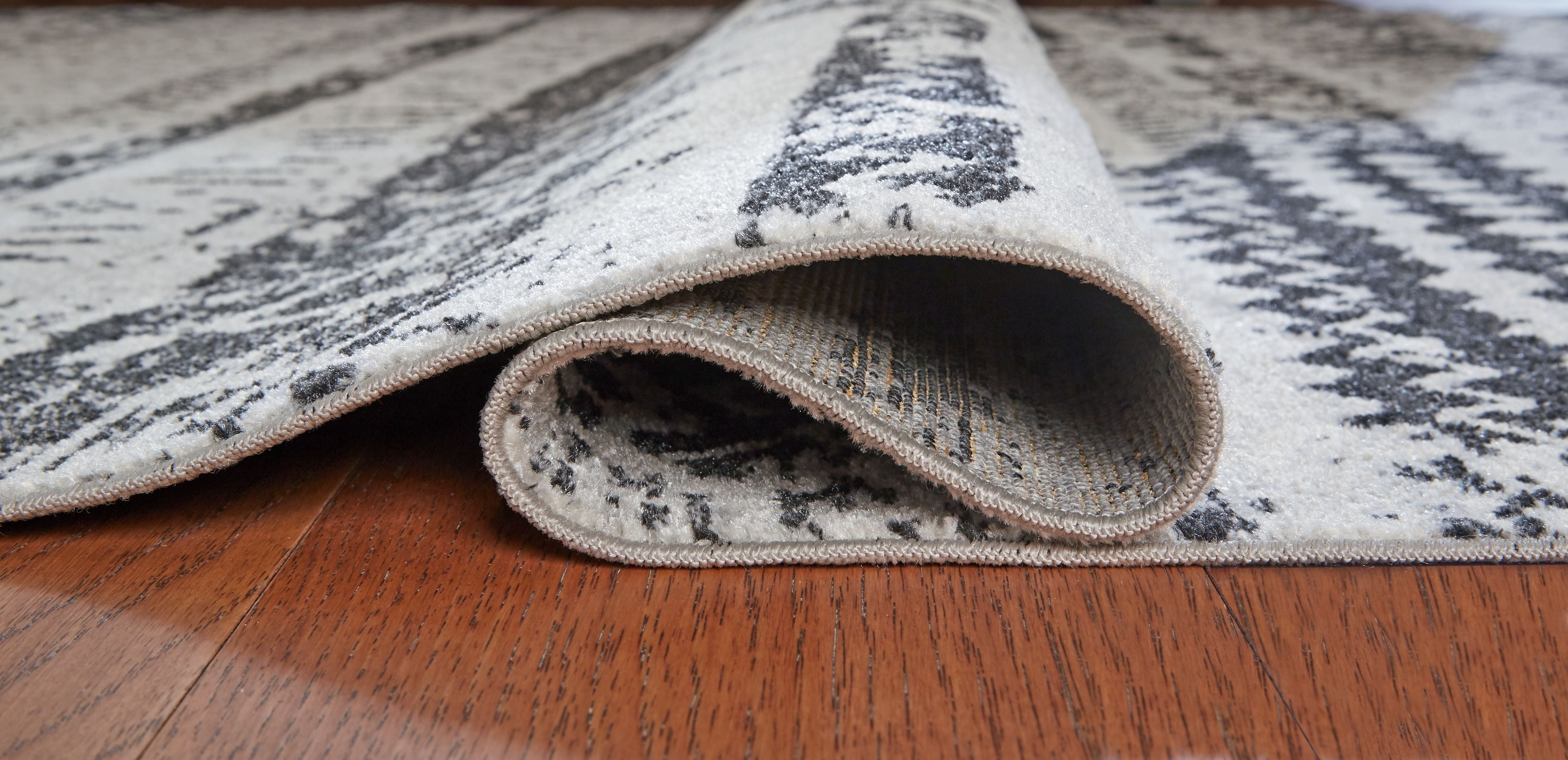 Signature Design by Ashley® Devman - Area Rug | Meri Furniture