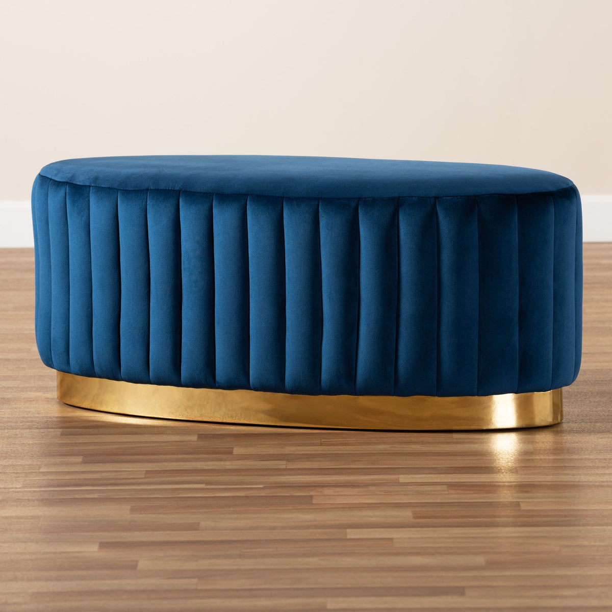 Kirana Glam and Luxe Navy Blue Velvet Fabric Upholstered and Gold PU Leather Ottoman