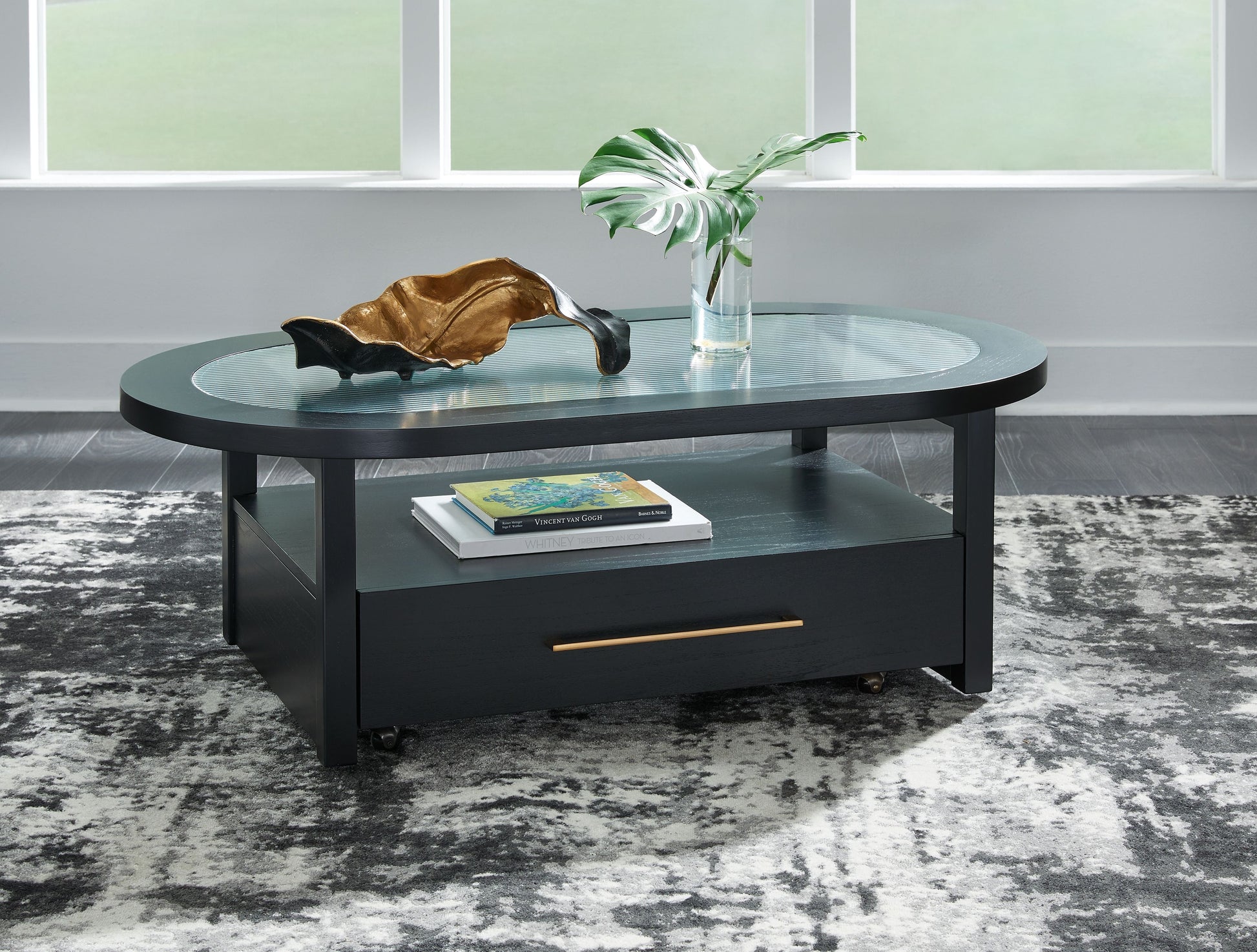 Signature Design by Ashley® Winbardi - Black - Oval Cocktail Table | Meri Furniture