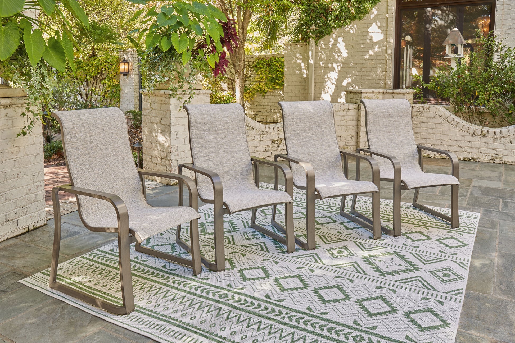 Signature Design by Ashley® Beach Front - Sling Arm Chair | Meri Furniture