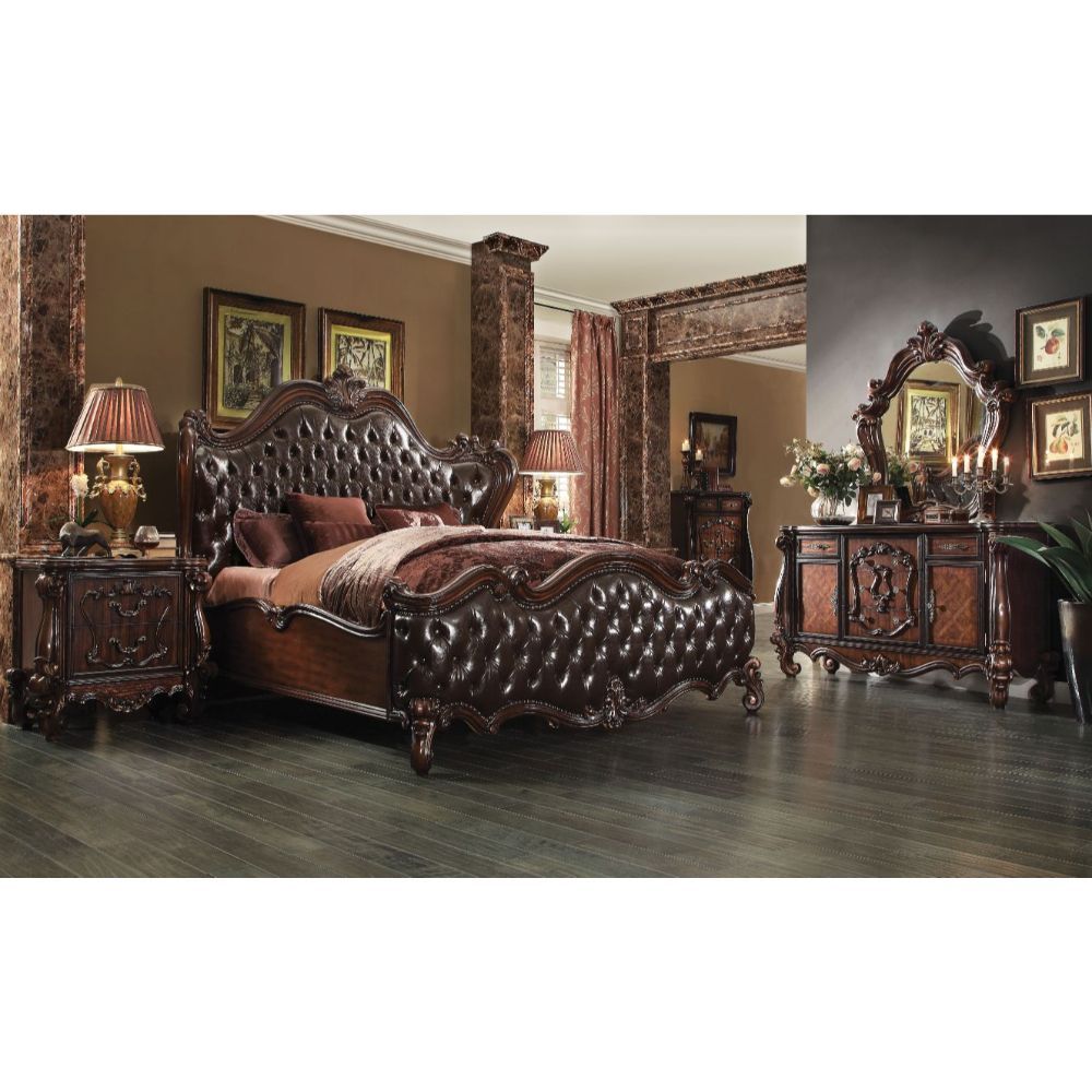 ACME Sleep like royalty with this Versailles Bed Set. The bedroom set was inspired by old European design. The bed features carved scrollwork accent with nailhead trim Decor and tufted upholstery on both headboard and footboard. | Meri Furniture