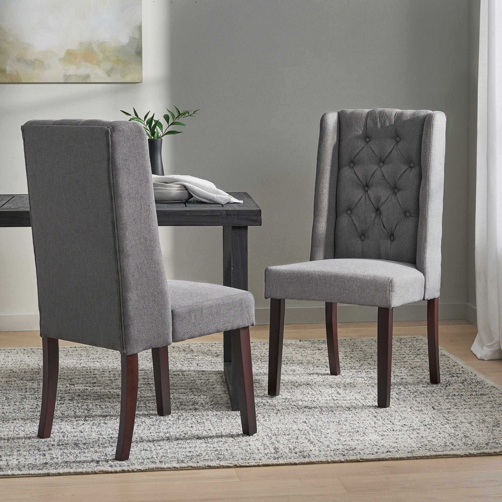Sophisticated Tufted Dining Chair With High Back Design