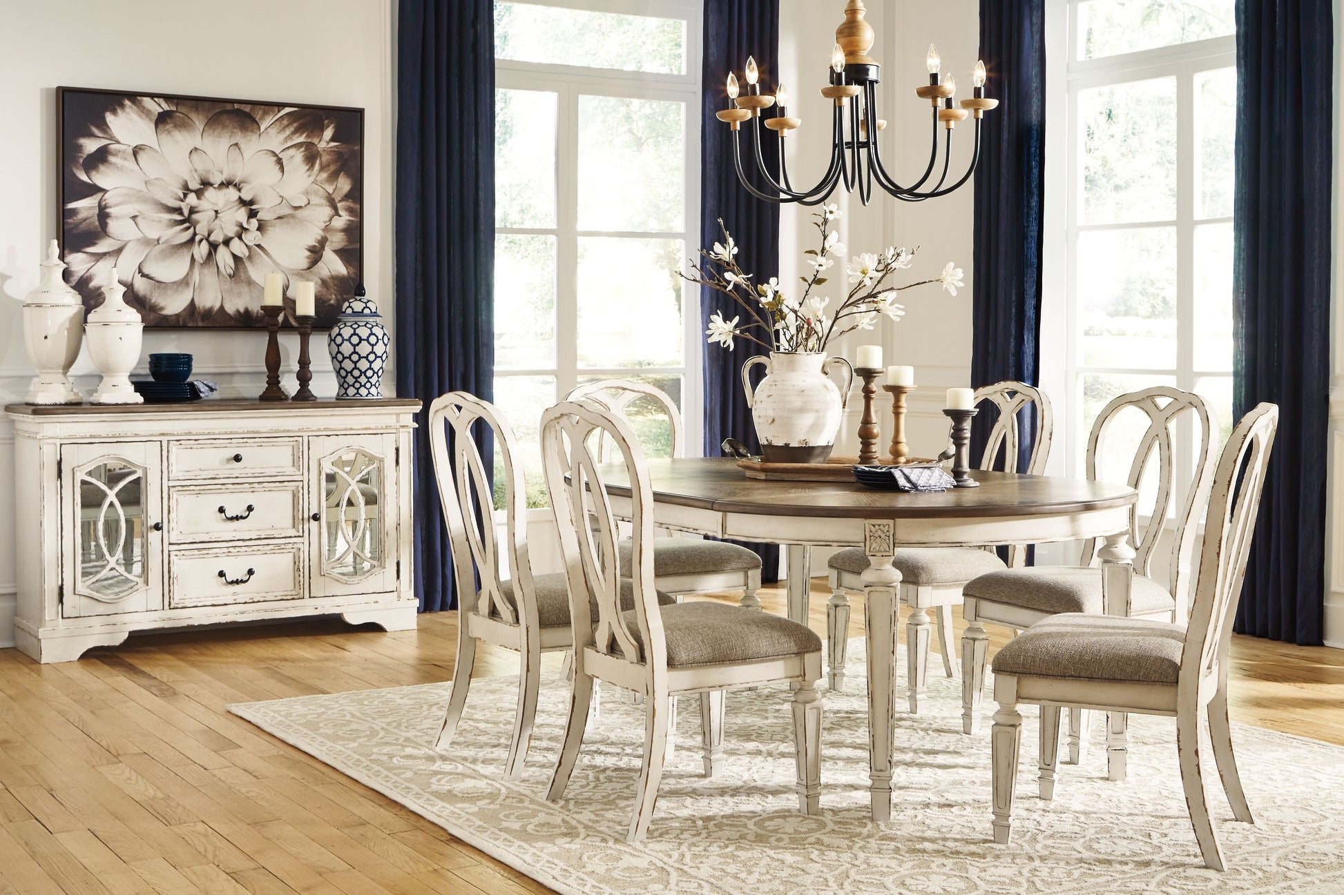 Signature Design by Ashley® Realyn - Oval Dining Table Set | Meri Furniture